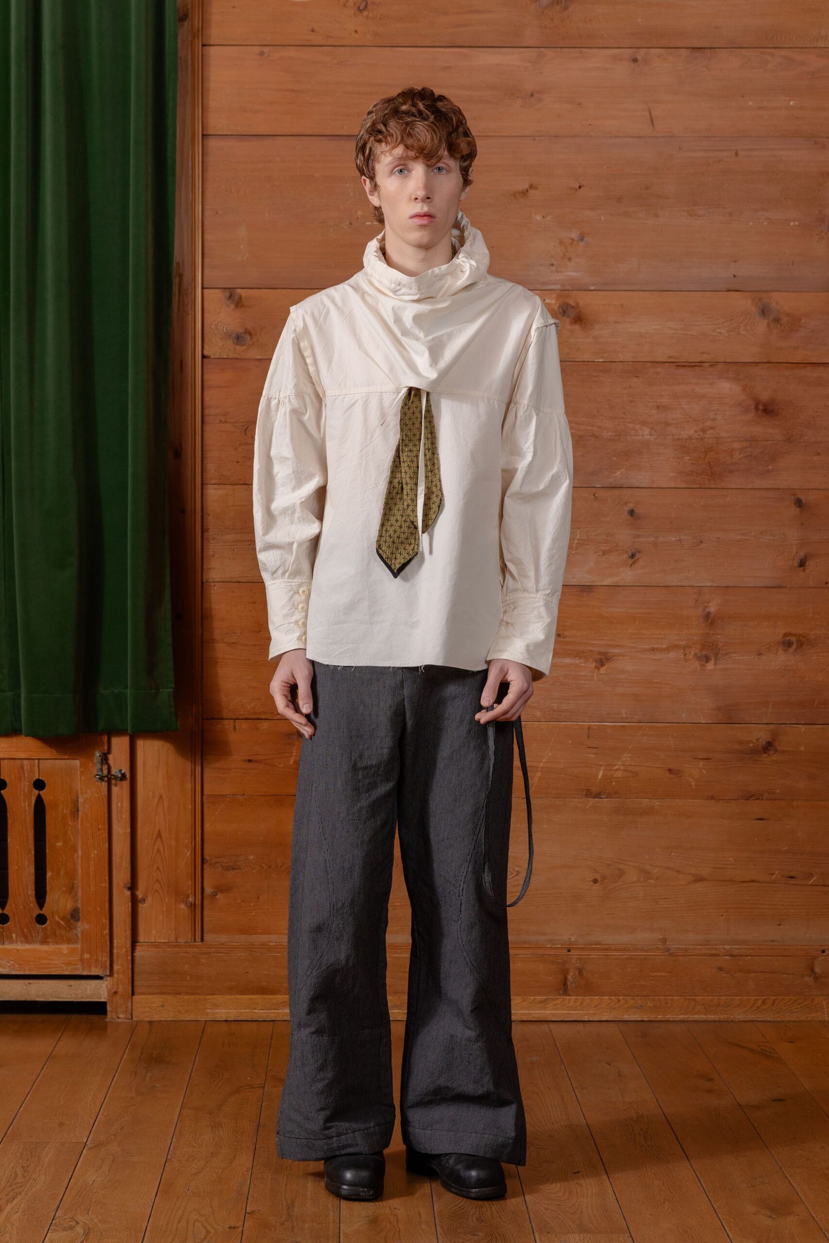 white relaxed shirt with gray pants