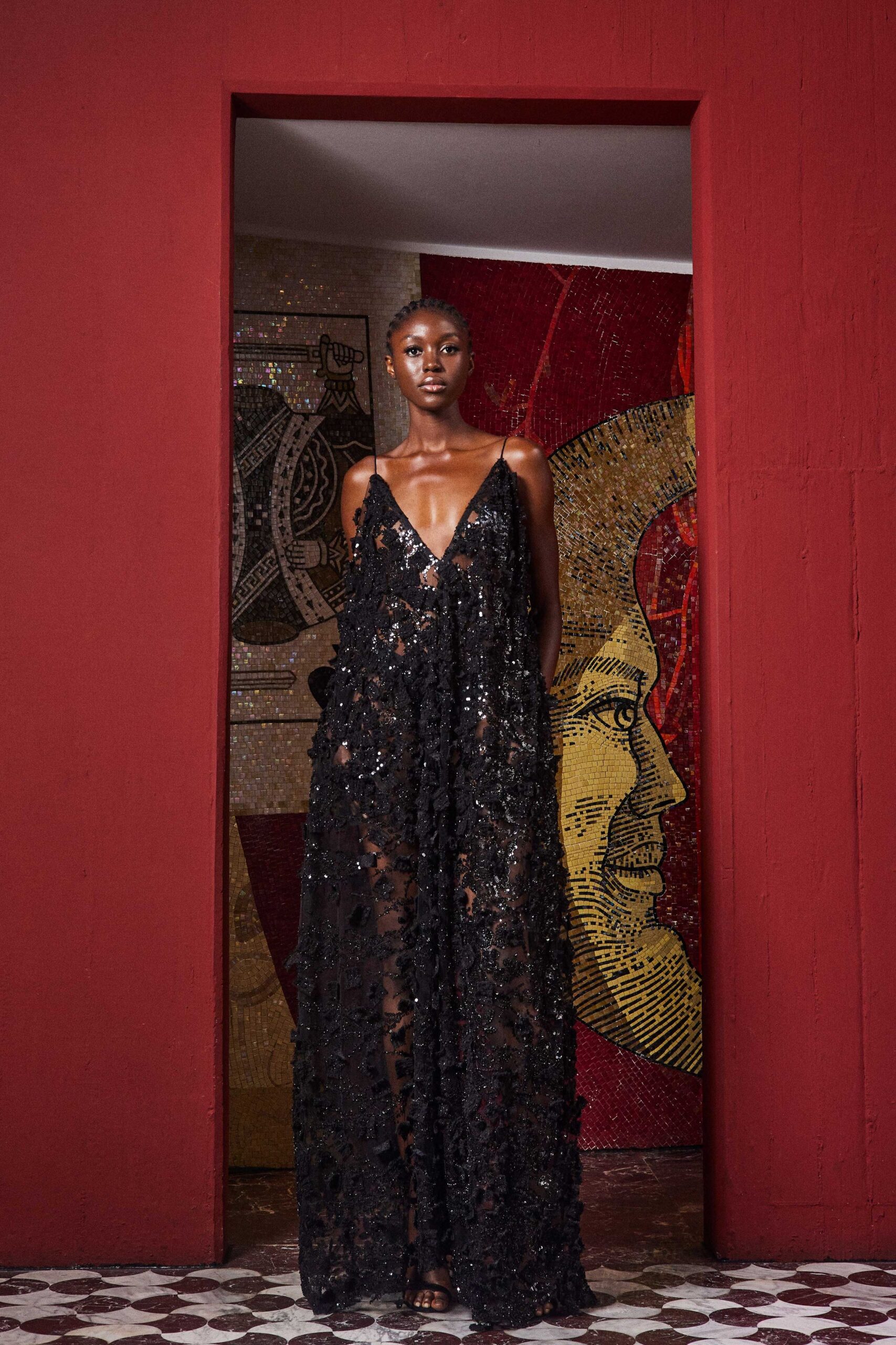 black sequin sleeveless gown