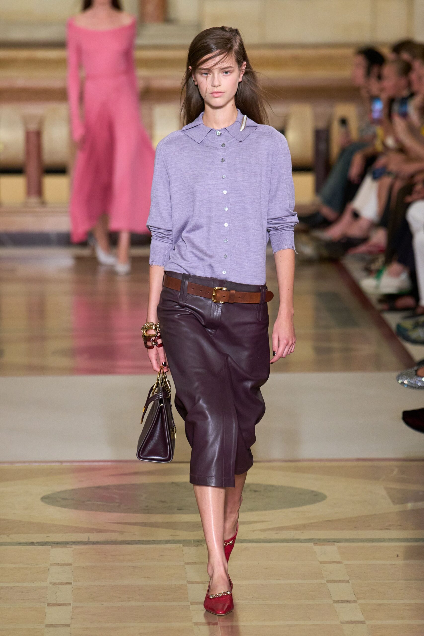 purple shirt brown leather skirt