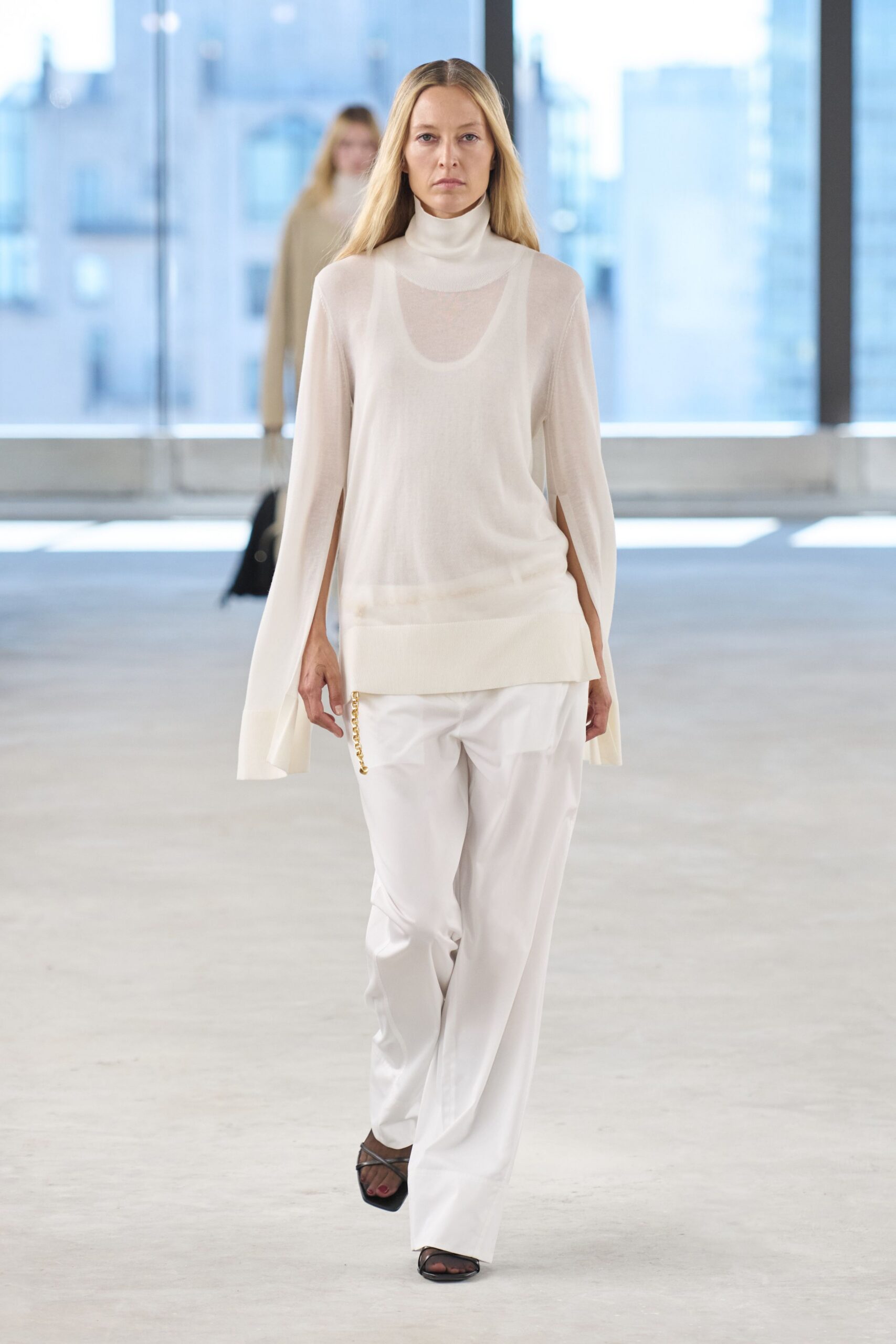 white relaxed top and pants