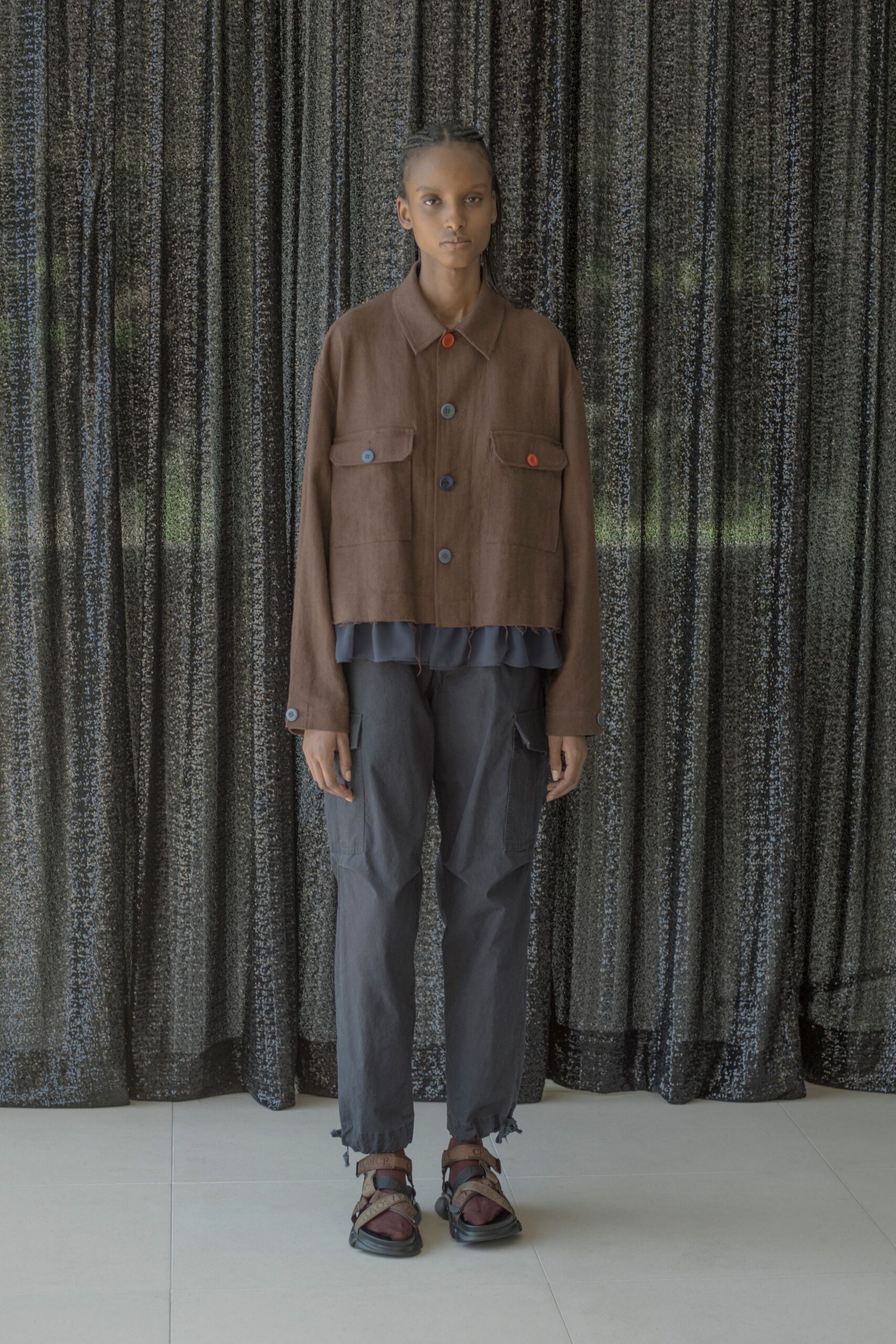 brown relaxed jacket with black top