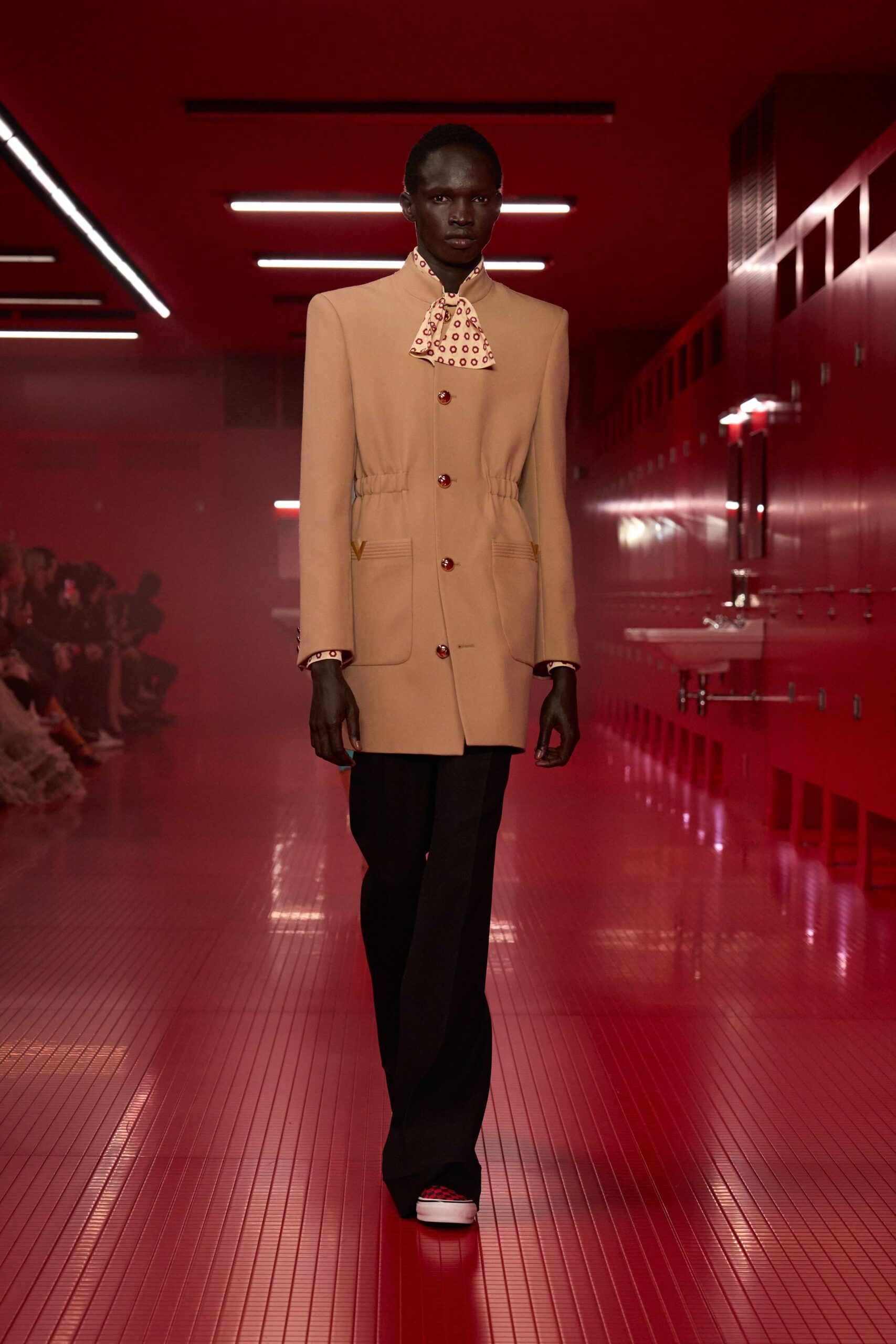 beige tailored blazer with black pants