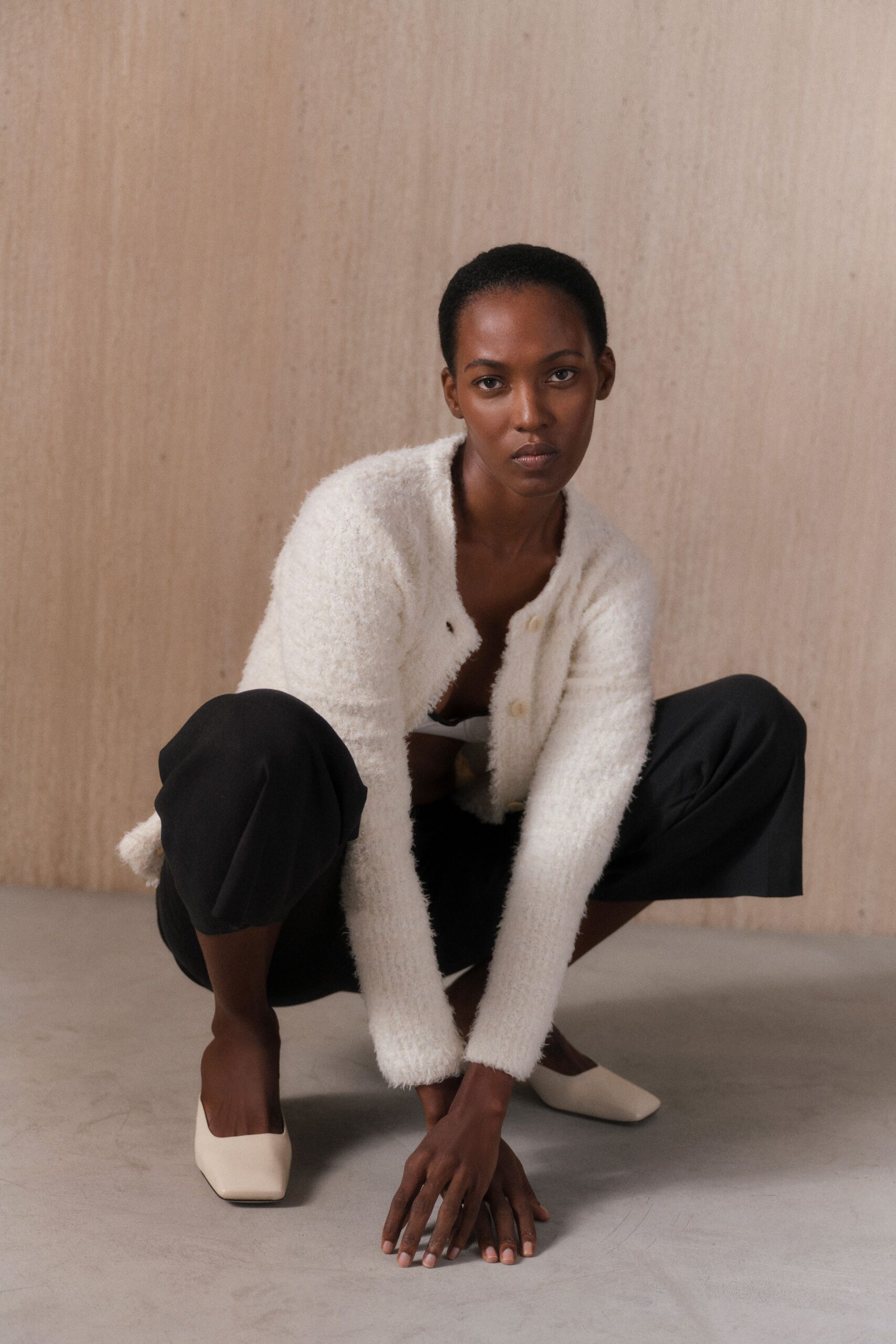 white wool long-sleeve collared relaxed textured cardigan
