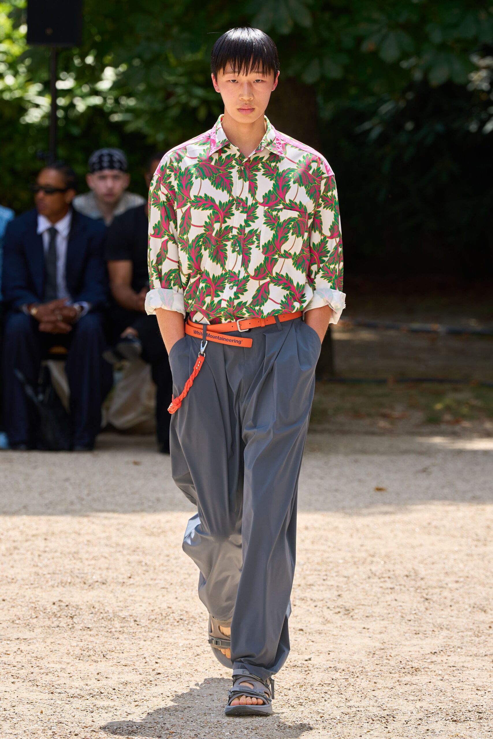 printed shirt and gray pants