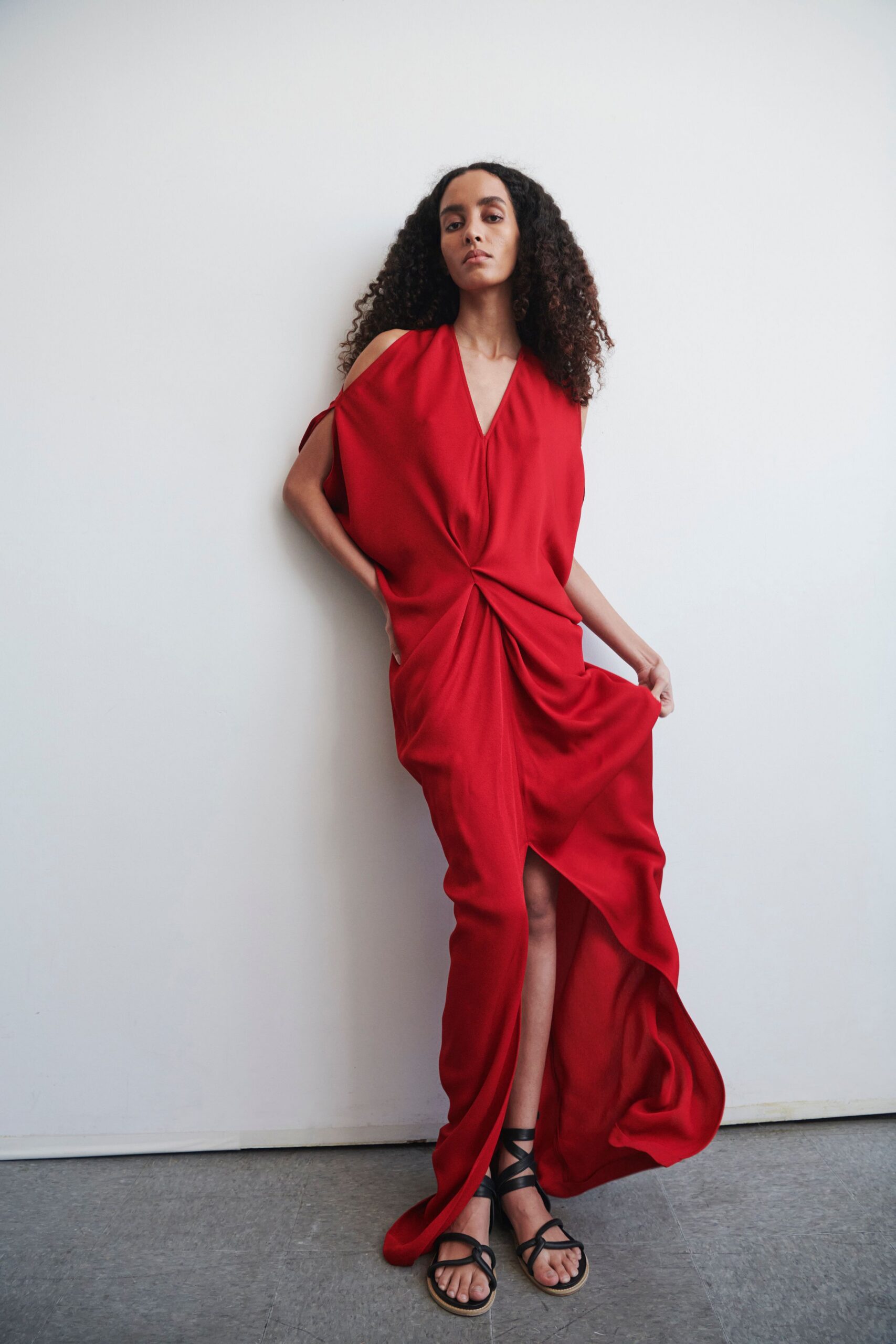 red silk sleeveless v-neck relaxed draped flowing gown