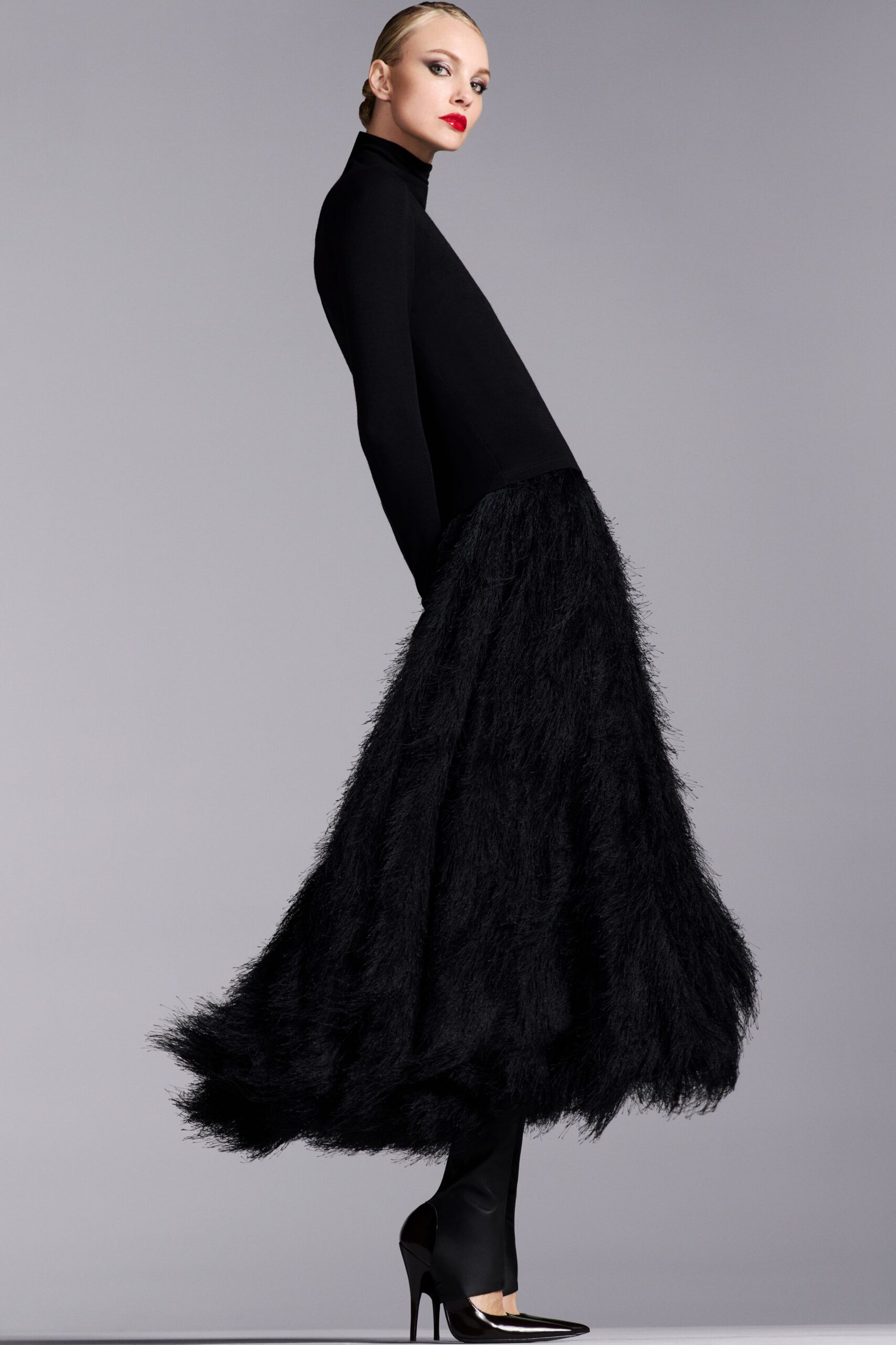 black wool long-sleeve high-neck fitted draped flowing dress