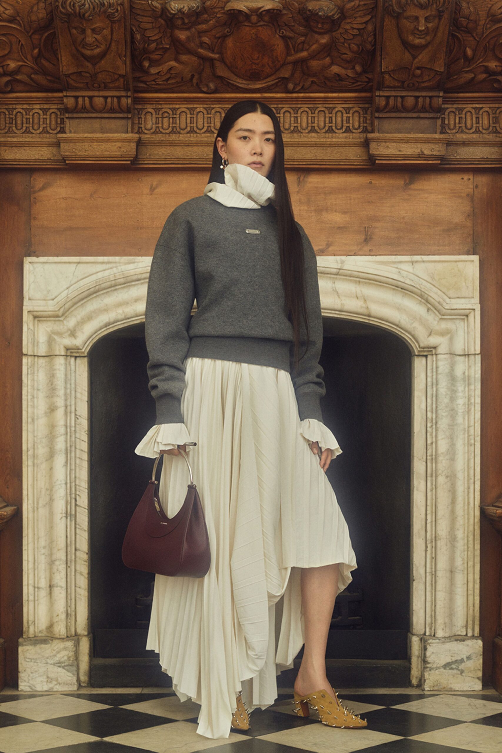 gray sweater white pleated skirt