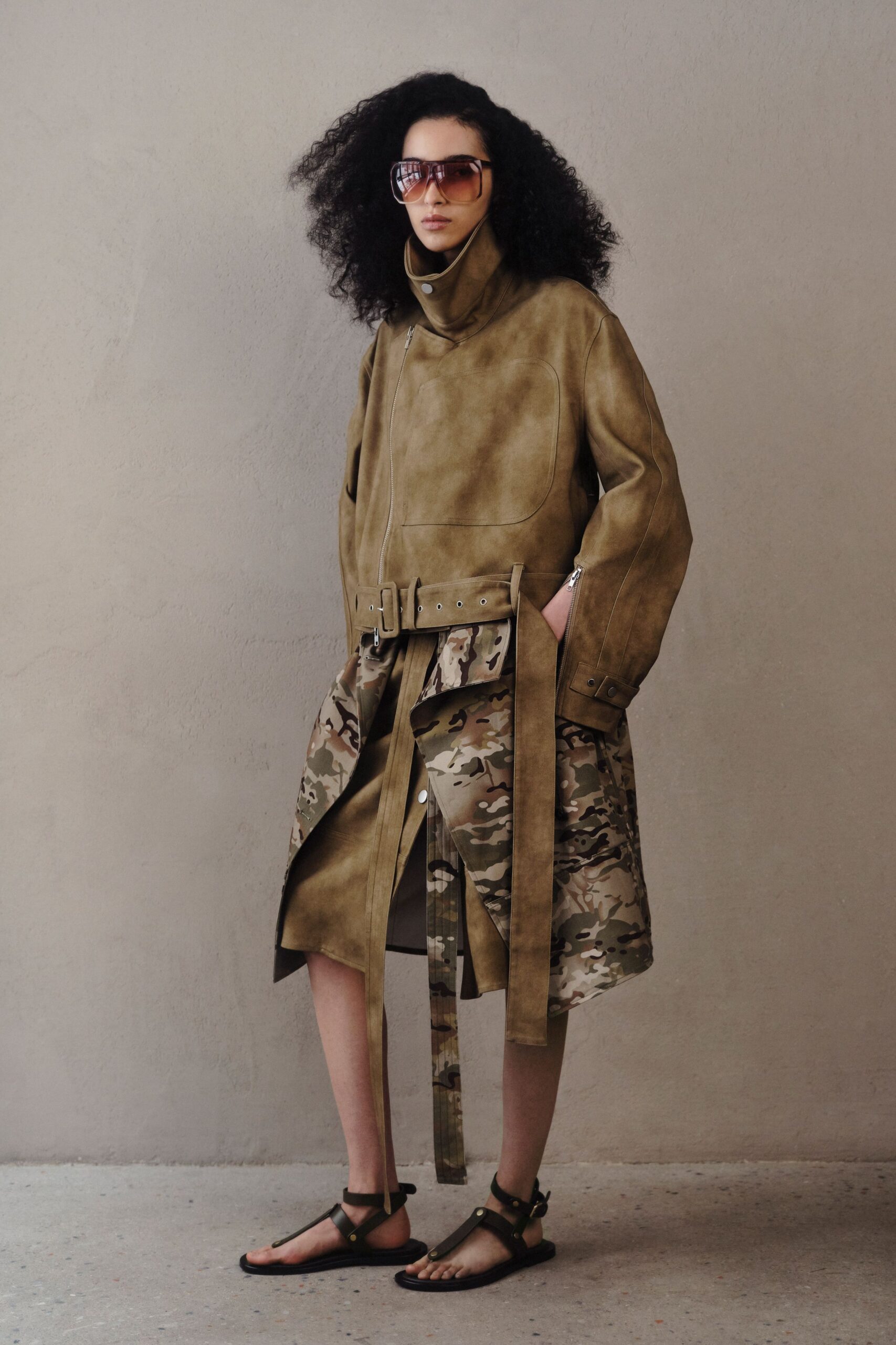 tan leather coat with camouflage skirt