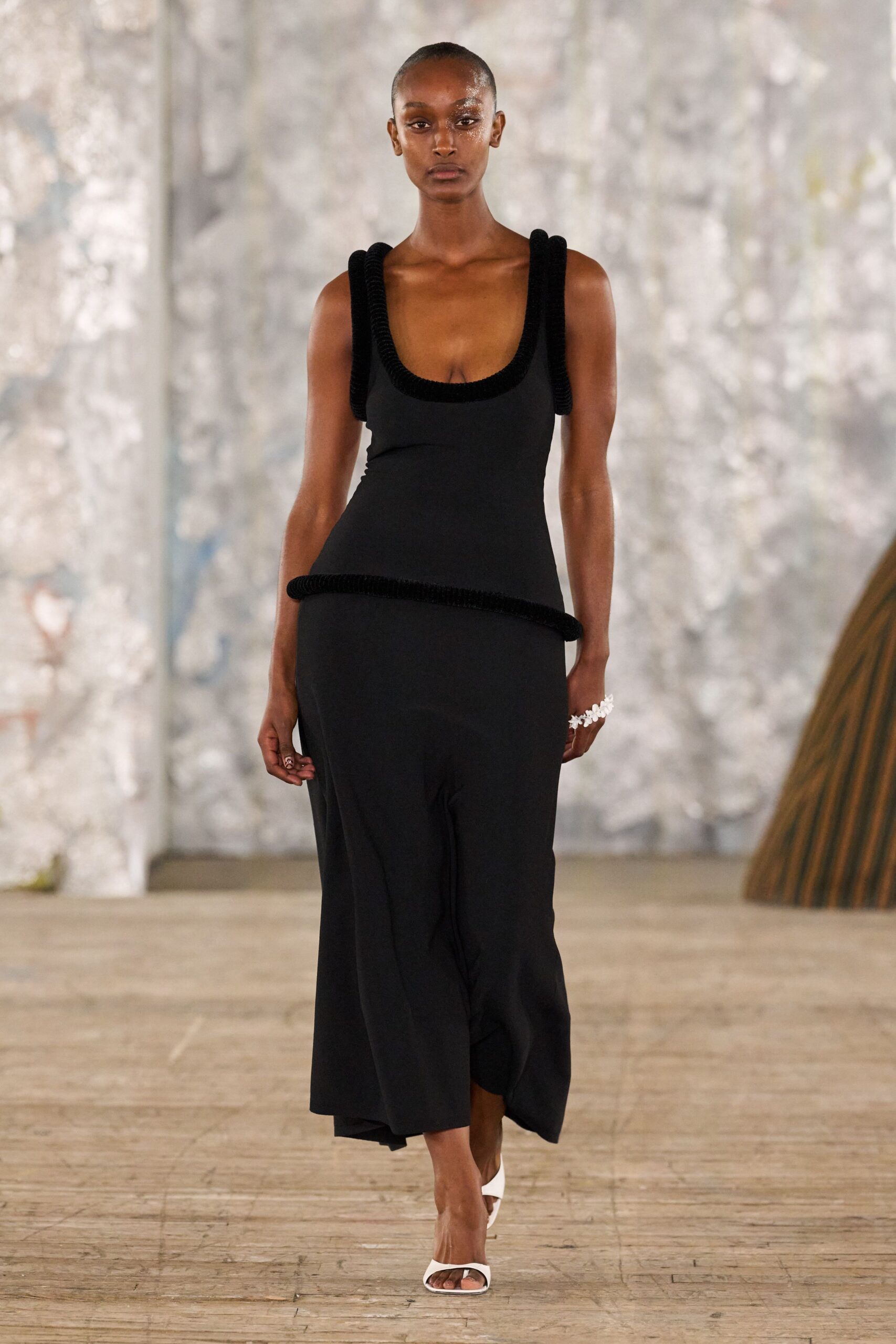 black fitted midi dress with white shoes