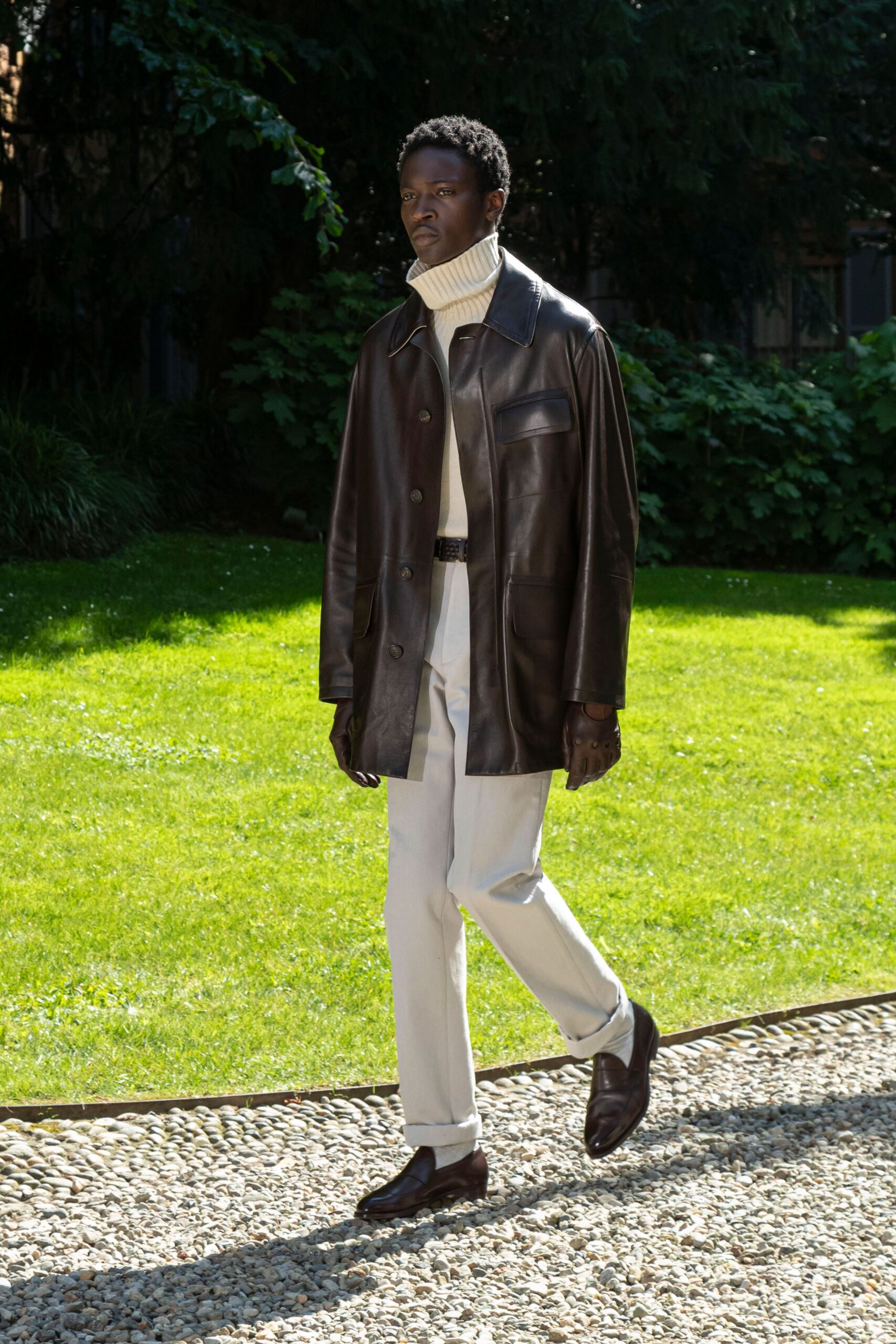 brown leather jacket with ivory sweater