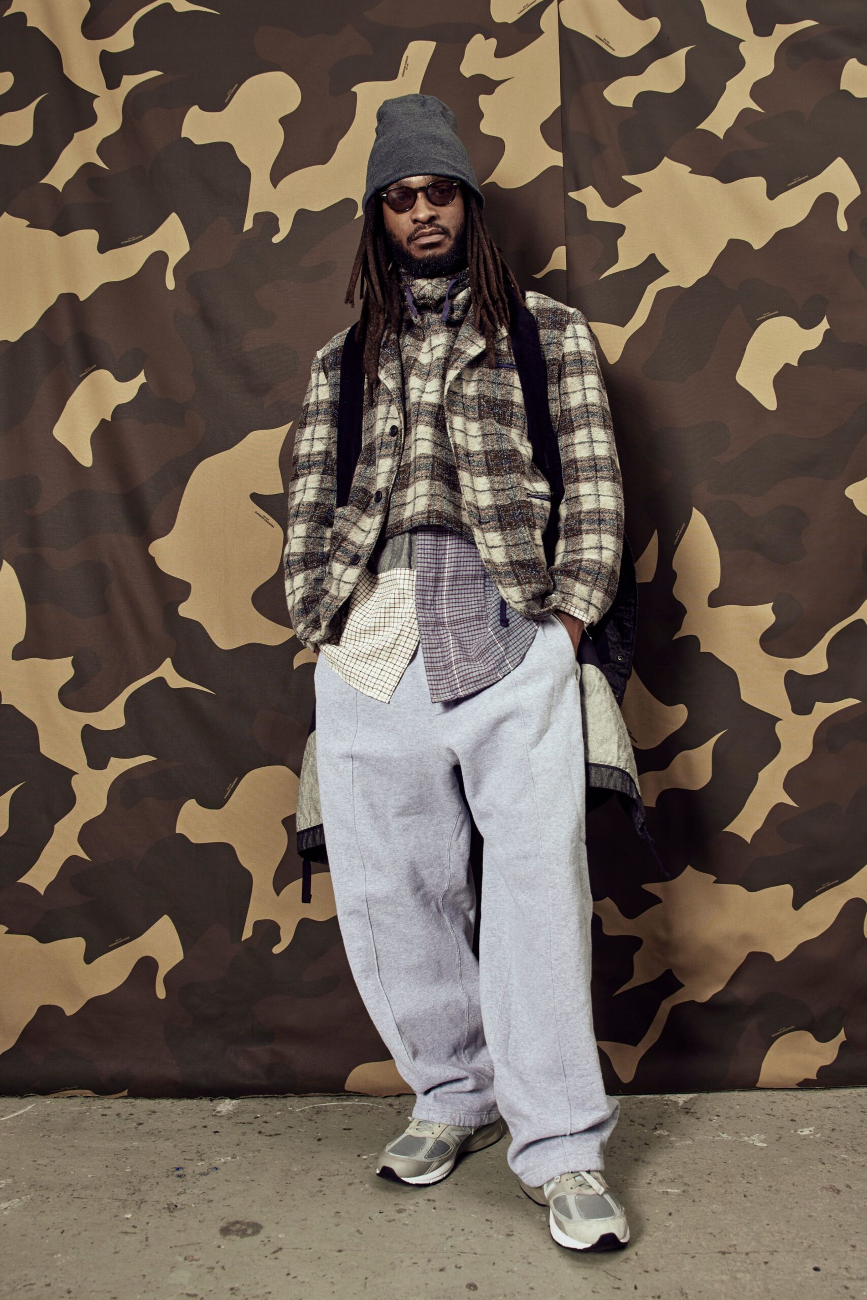 black cotton long-sleeve collared relaxed checked vest
