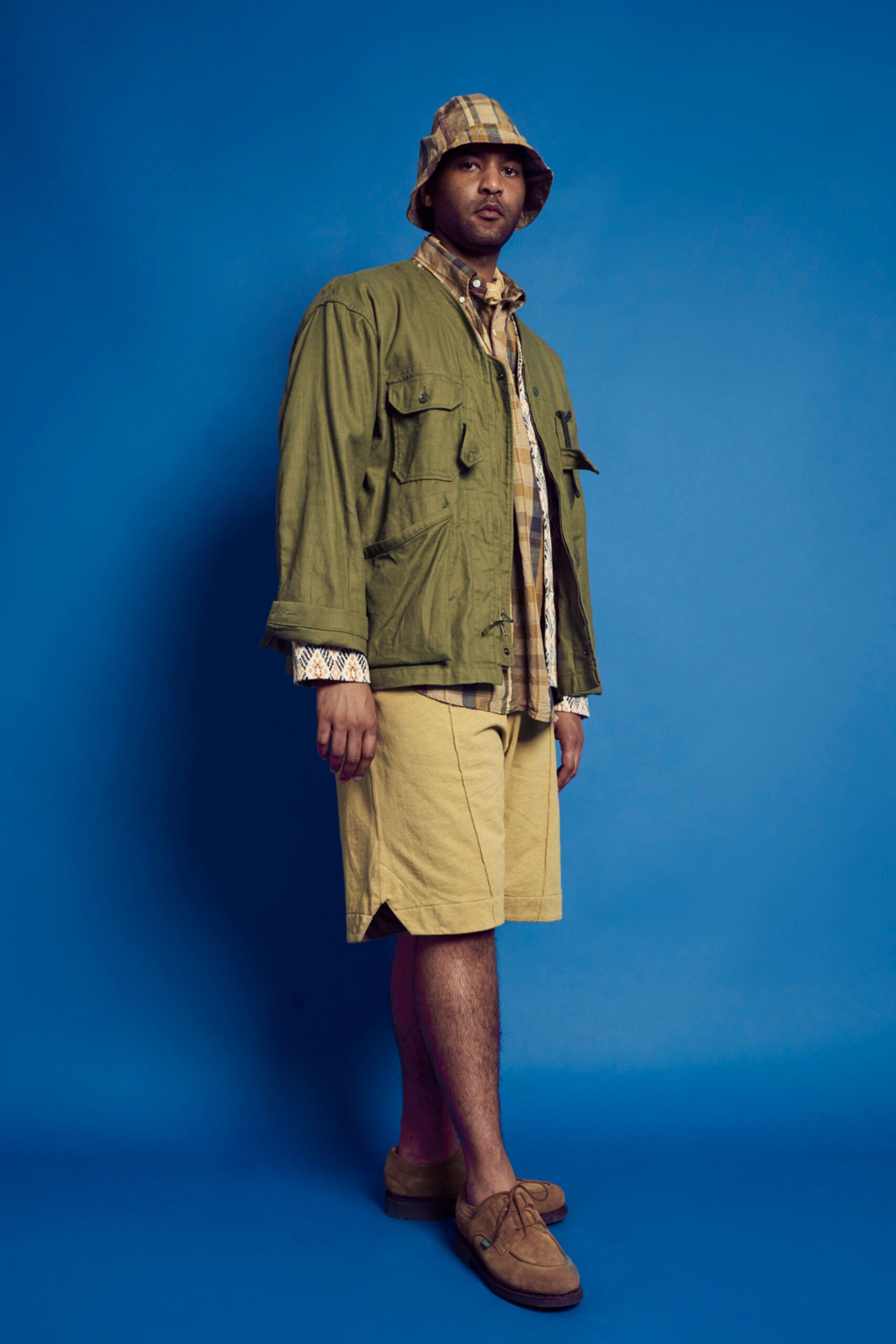 green cotton long-sleeve collared relaxed buttoned pockets jacket