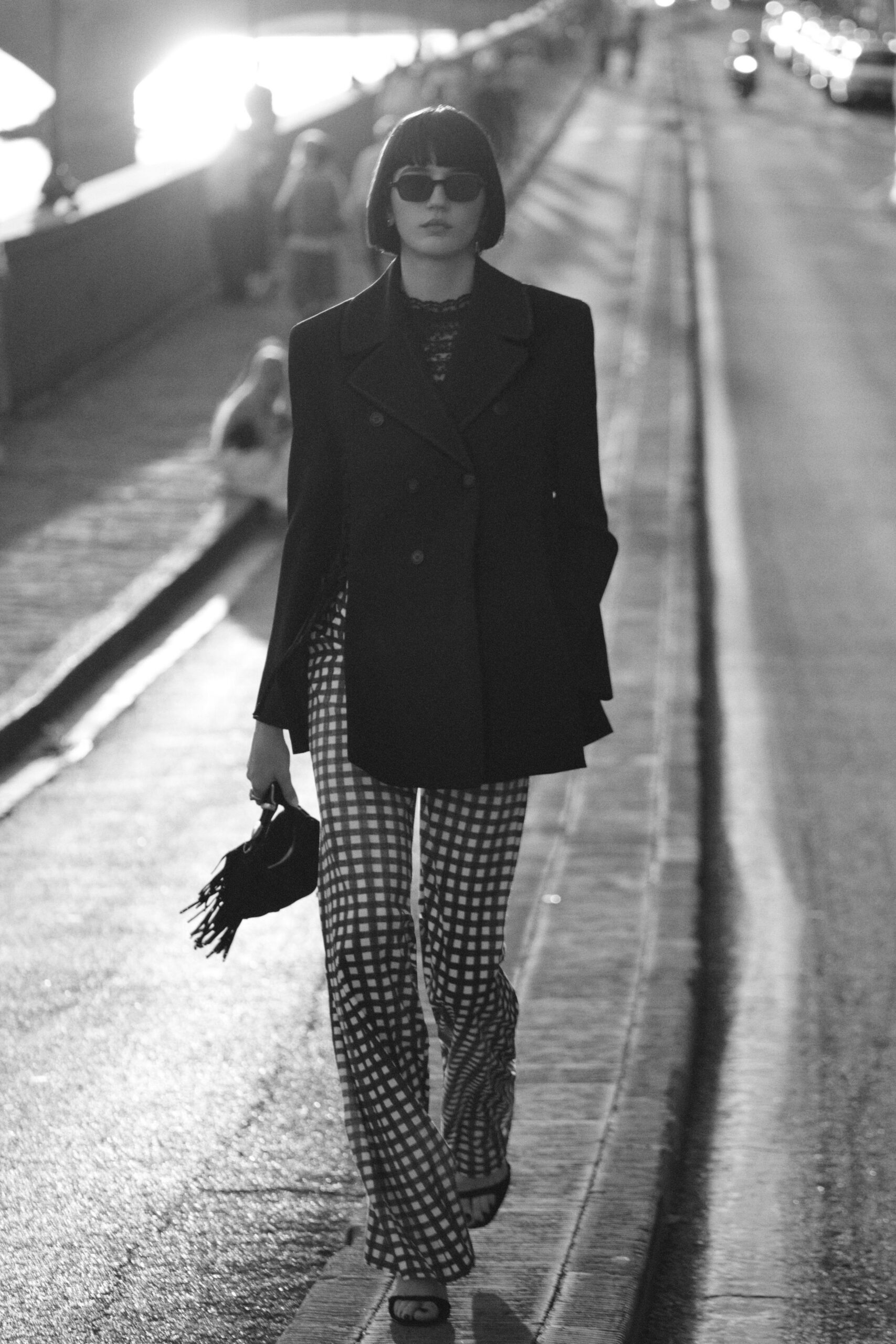 black blazer with checked pants