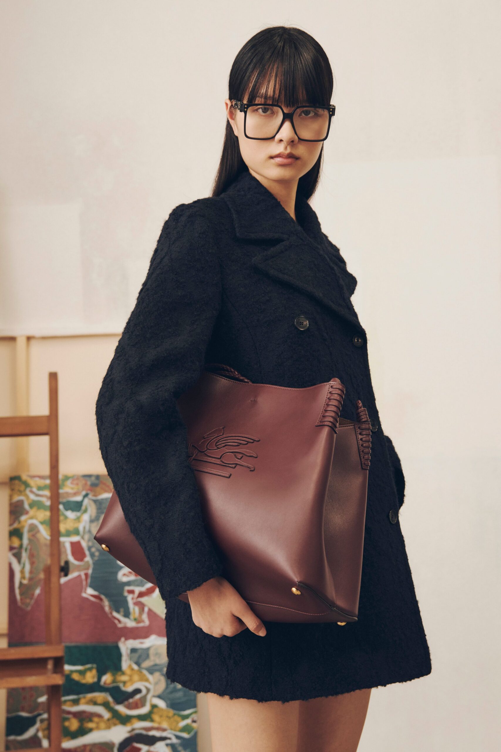 black wool long-sleeve collared fitted textured coat
