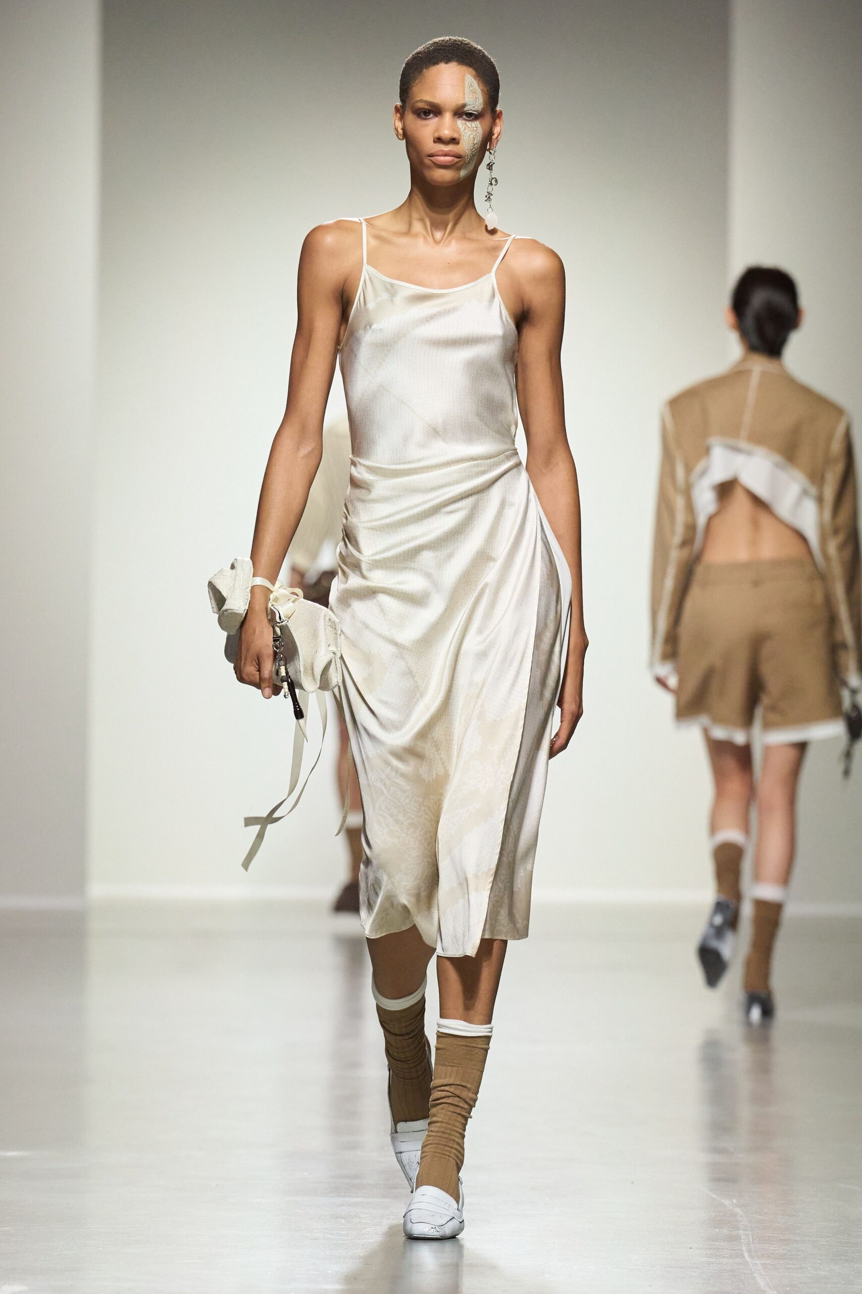 beige silk sleeveless v-neck fitted draped sheer dress