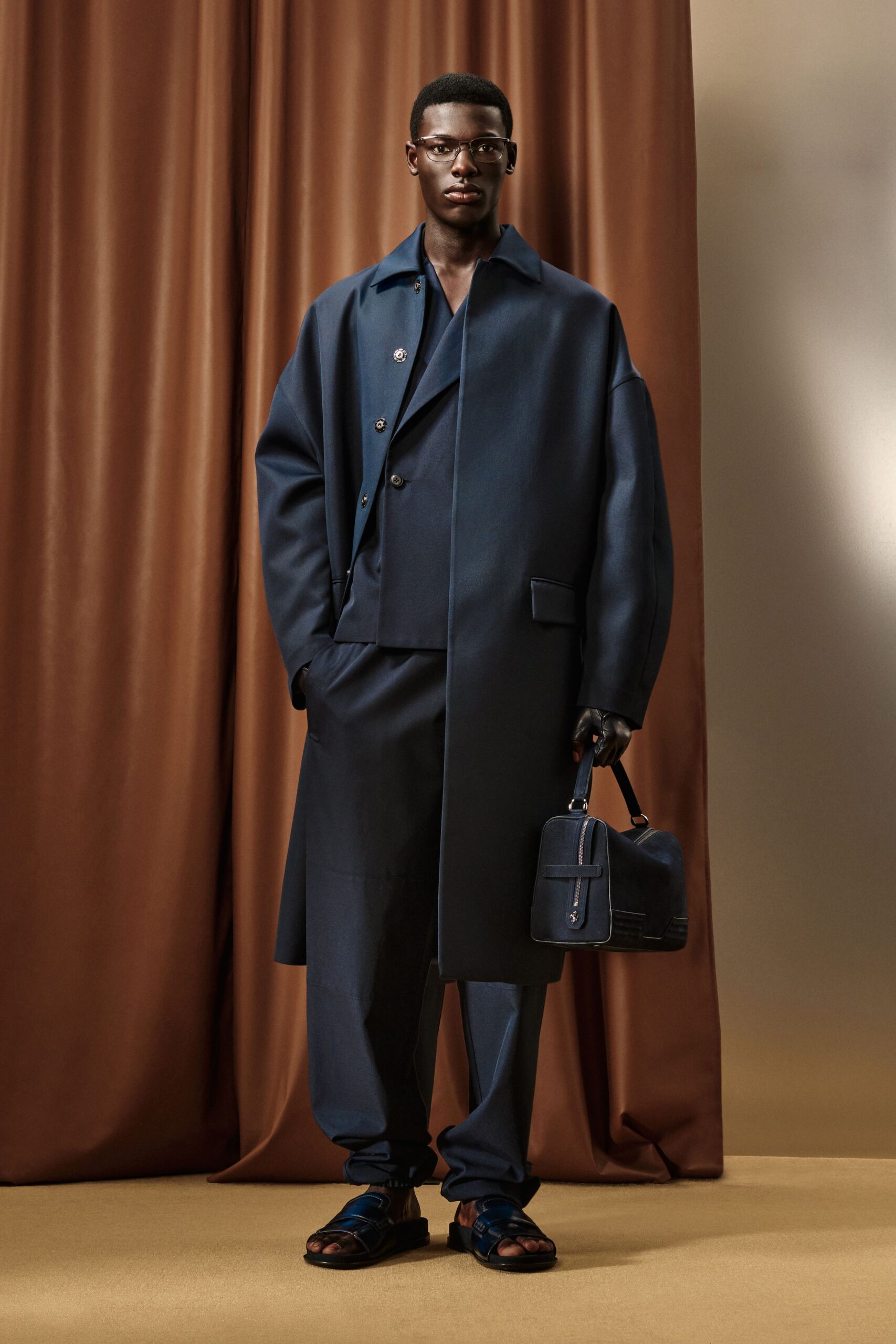 blue wool long-sleeve collared oversized buttoned midi coat