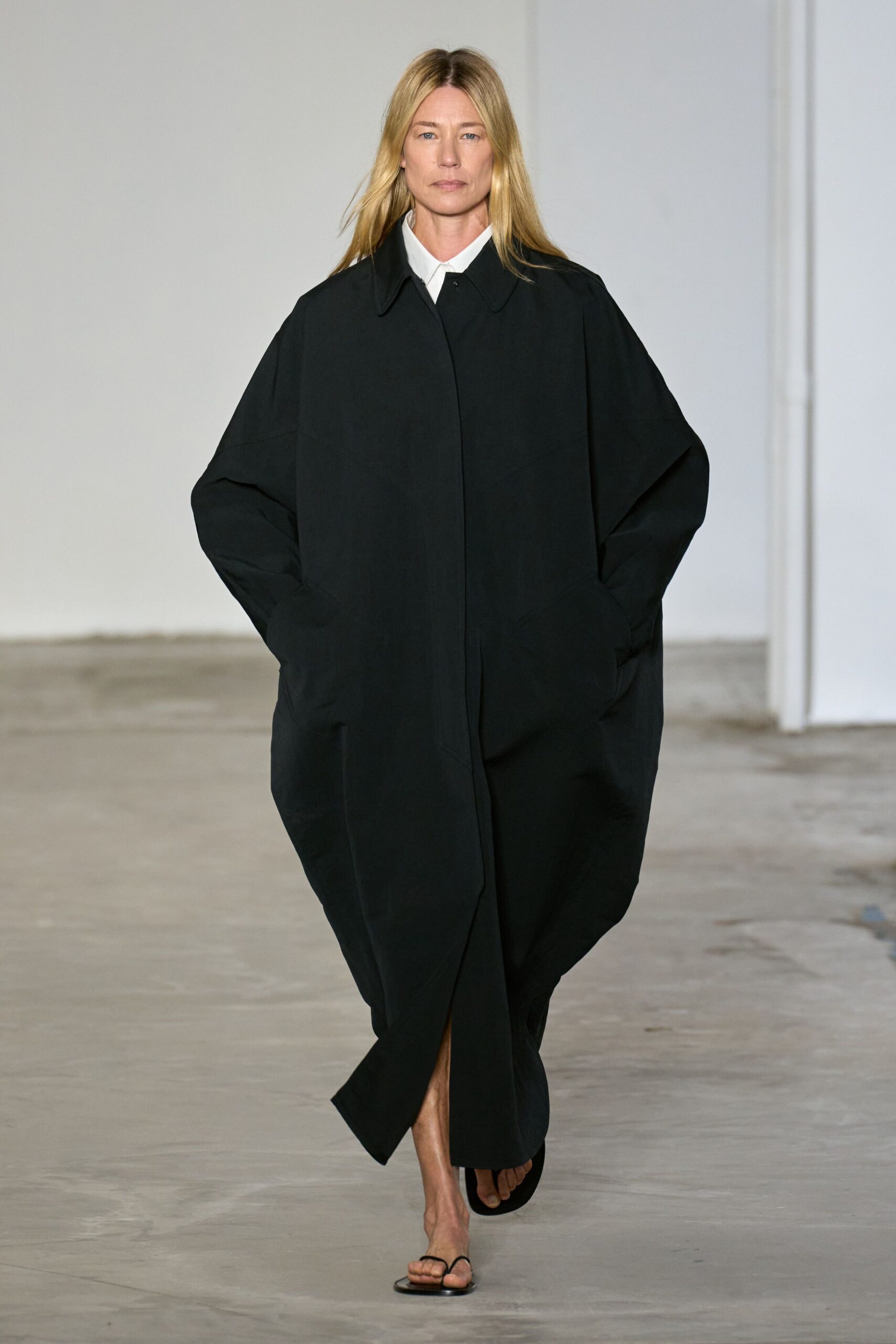 black oversized coat with sandals