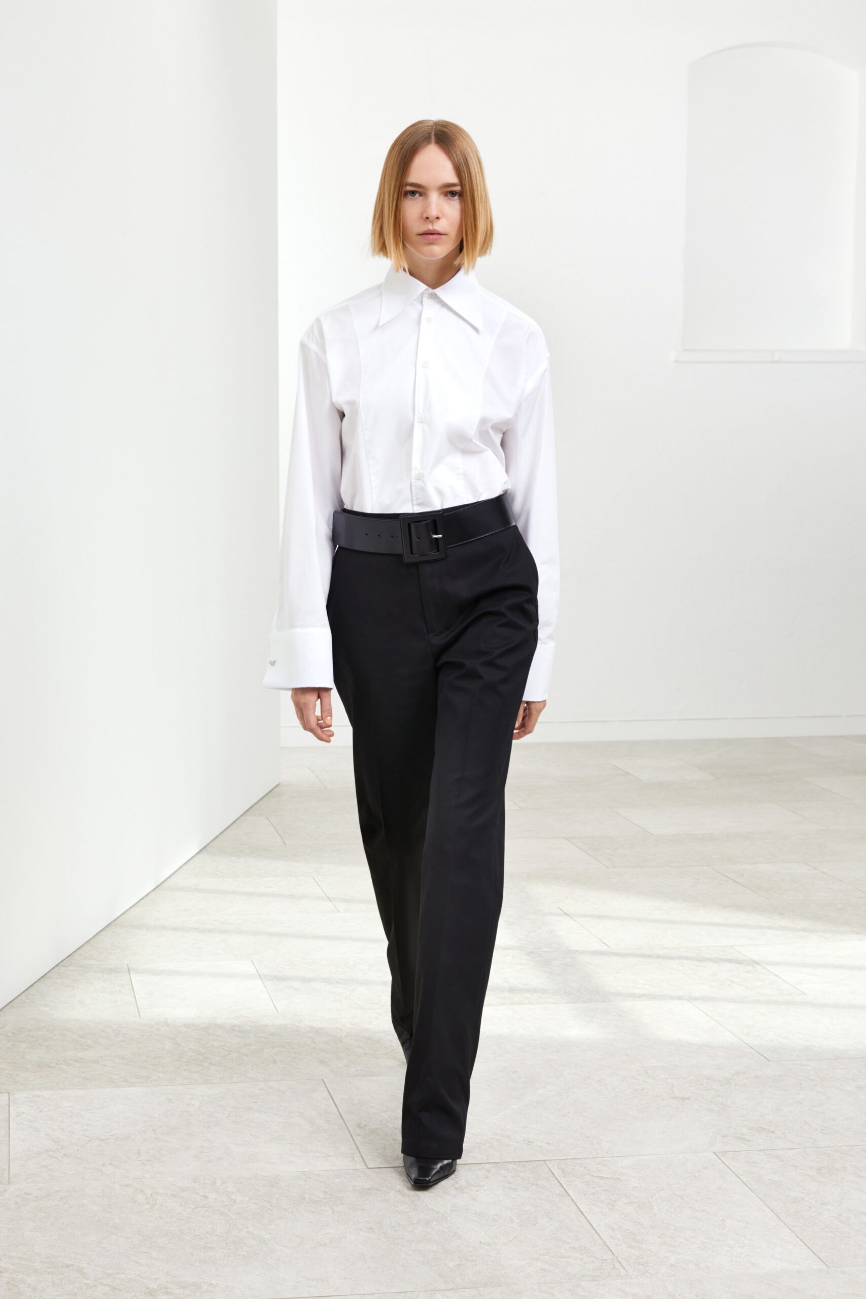 white relaxed shirt black tailored pants