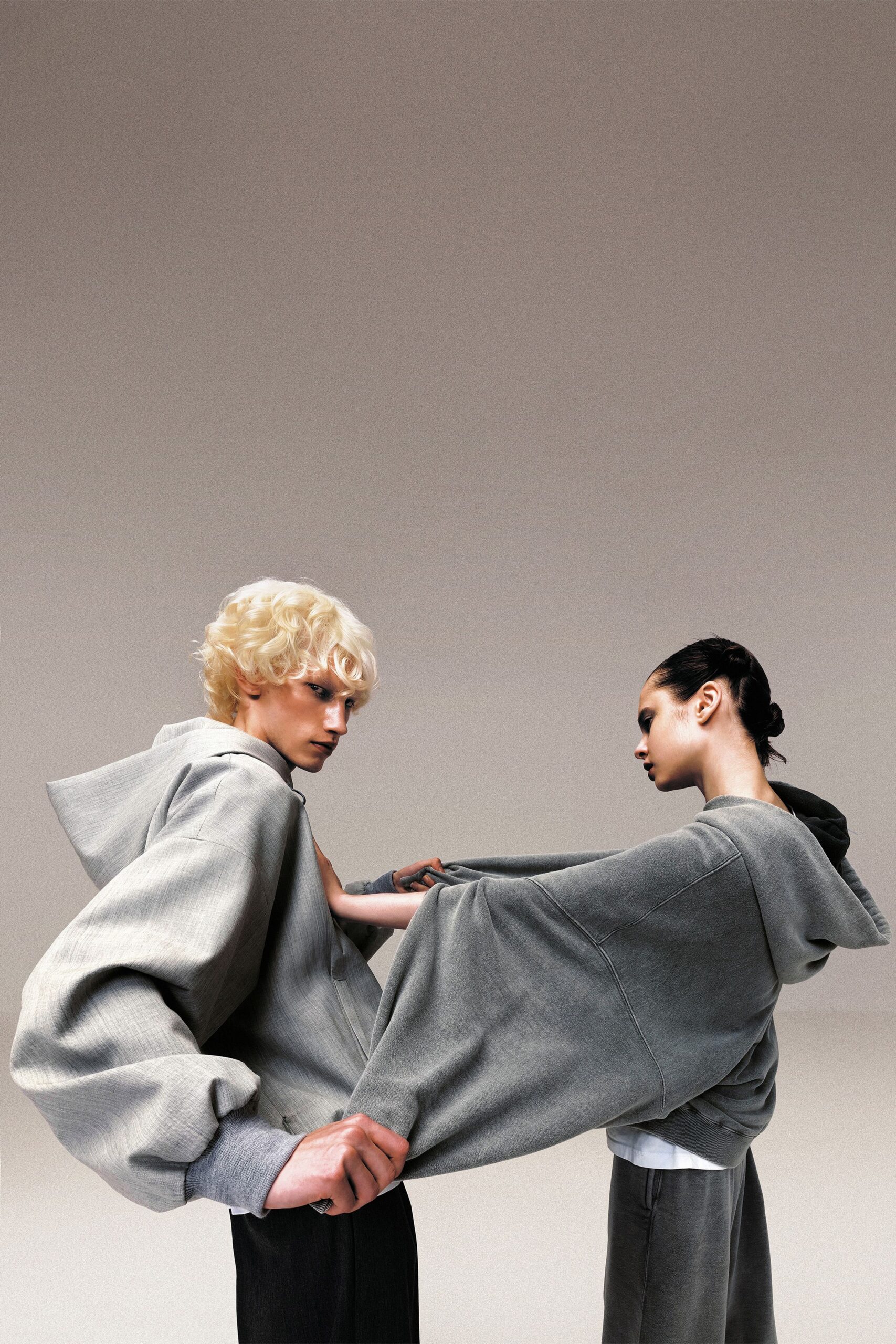 gray hoodies with black pants