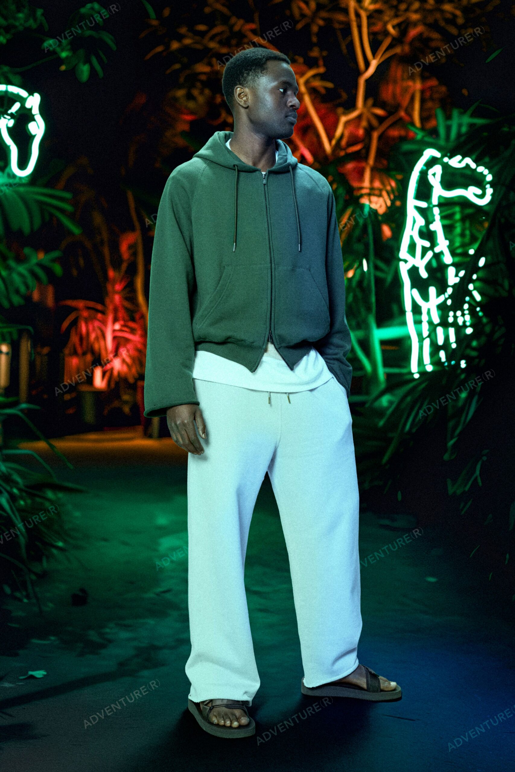 green hoodie with white t-shirt and pants
