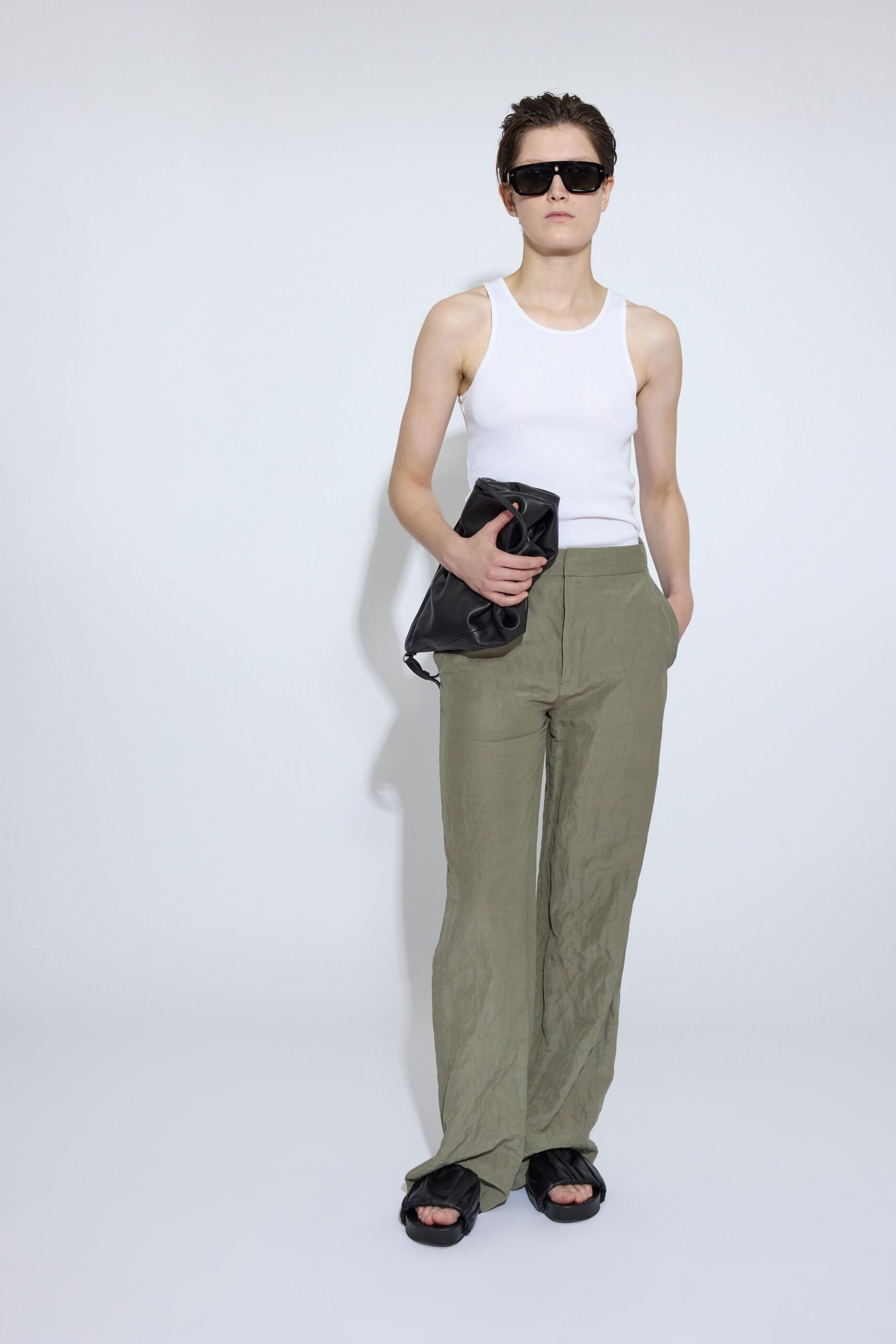 white tank-top with green pants
