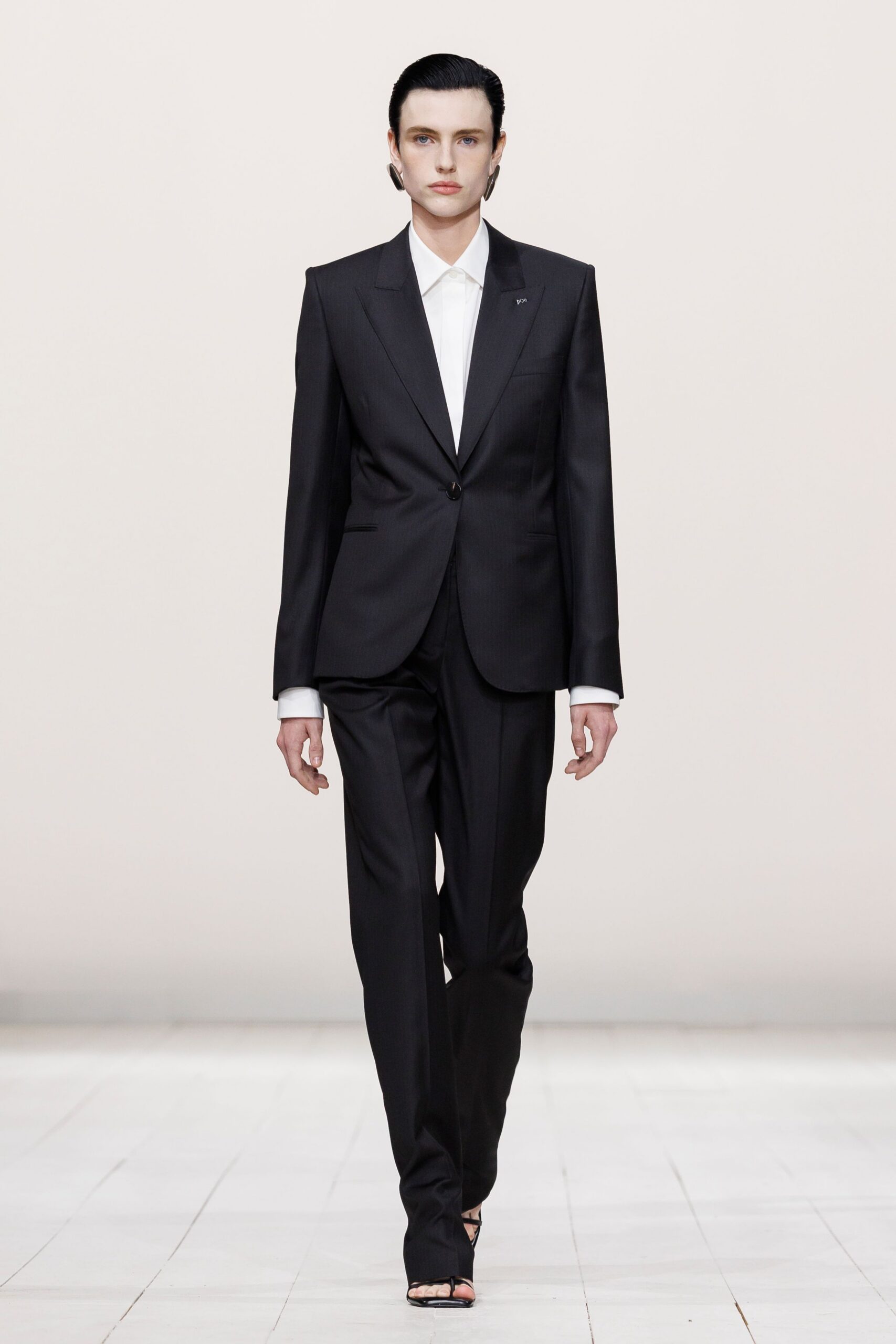 black tailored suit with heels