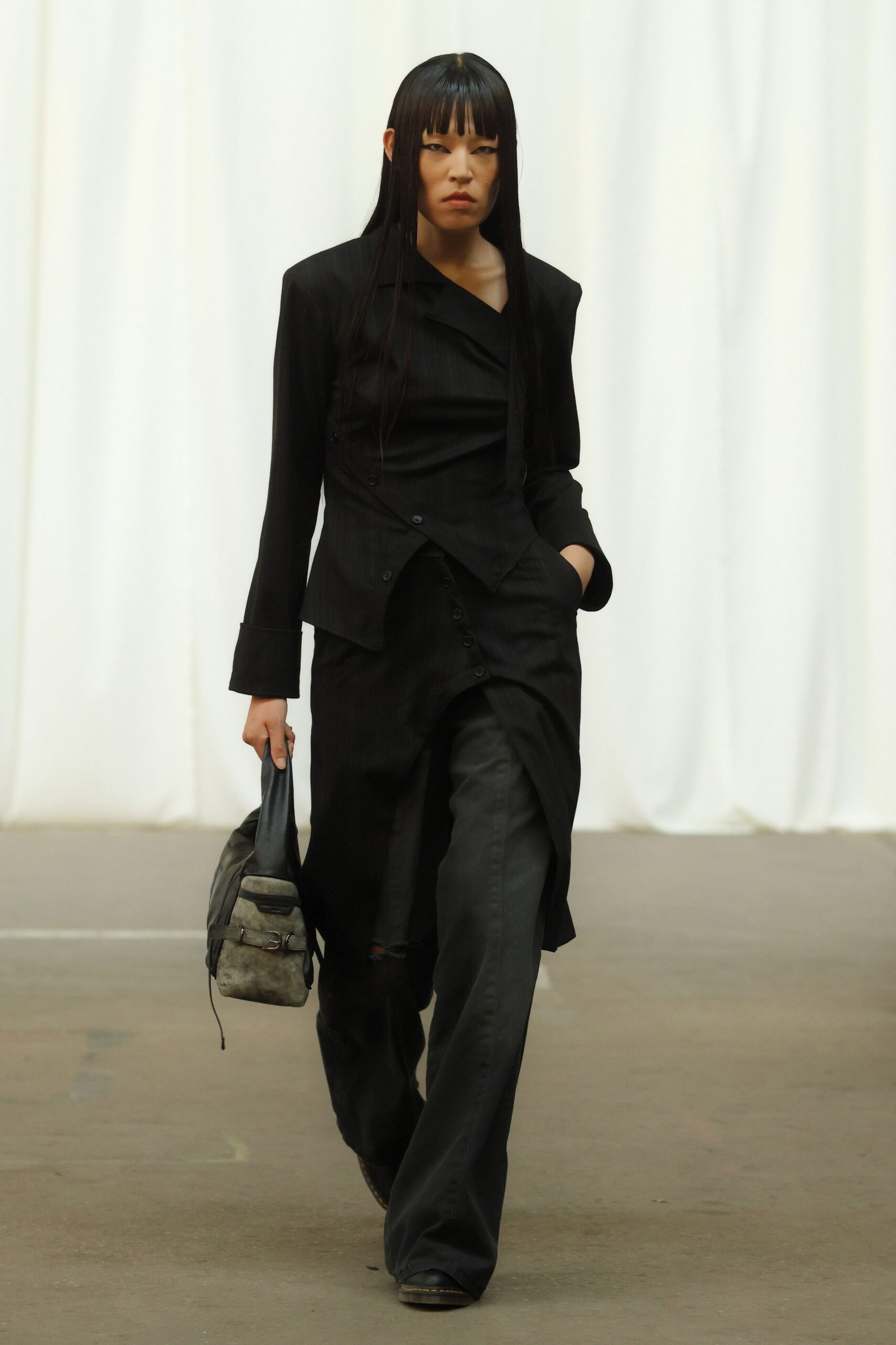 black tailored blazer with relaxed pants