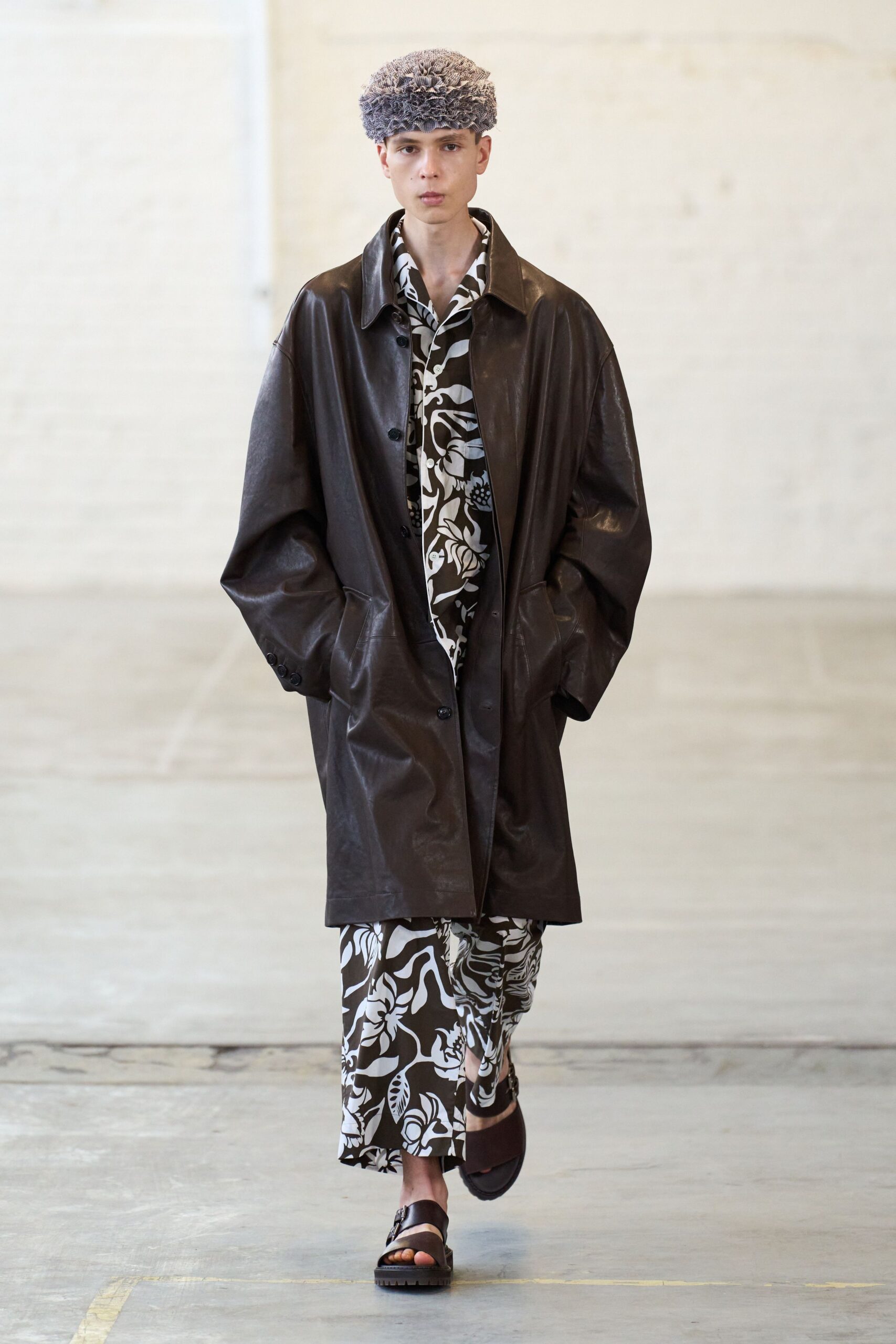 brown leather coat with printed shirt