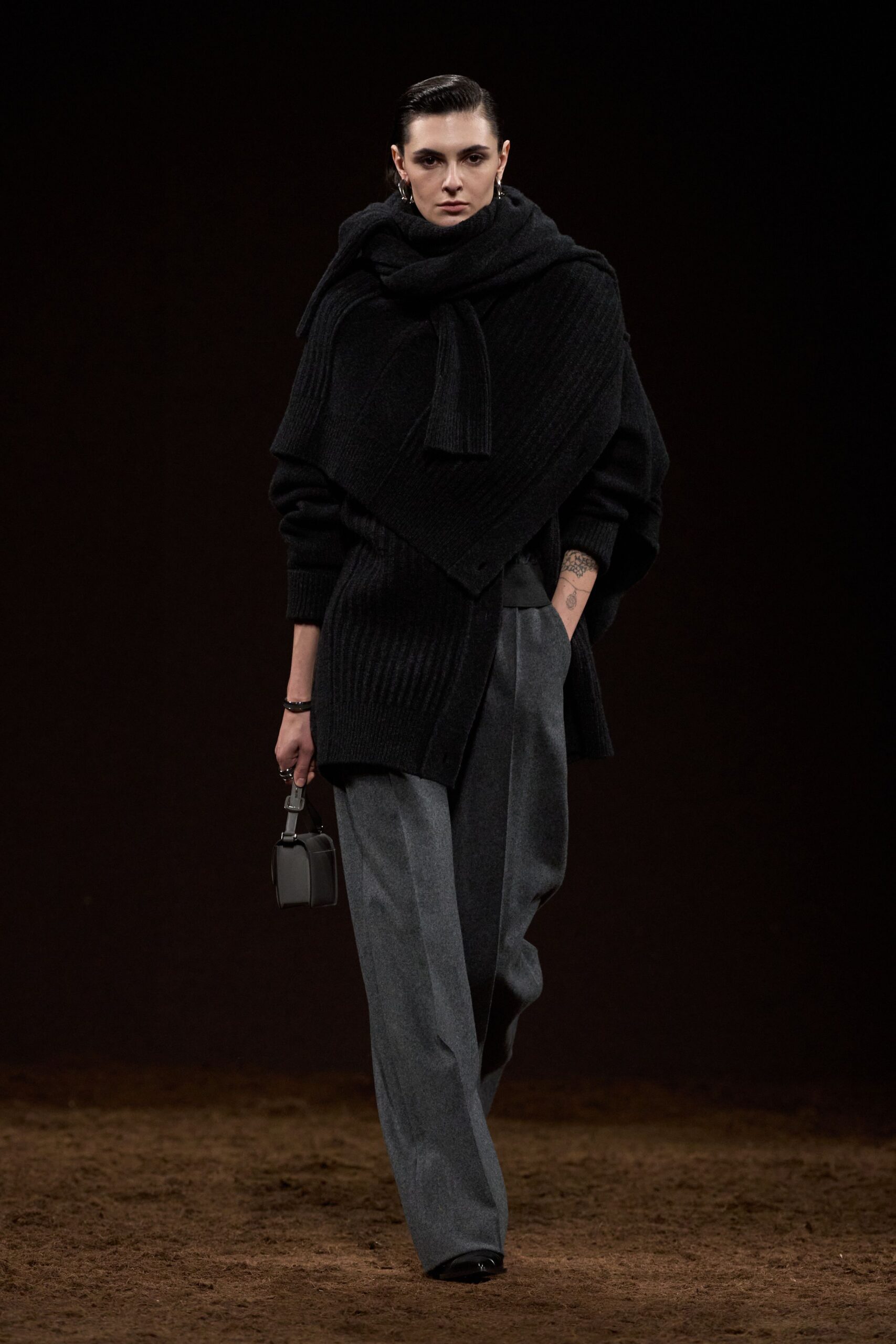 black oversized sweater with gray pants