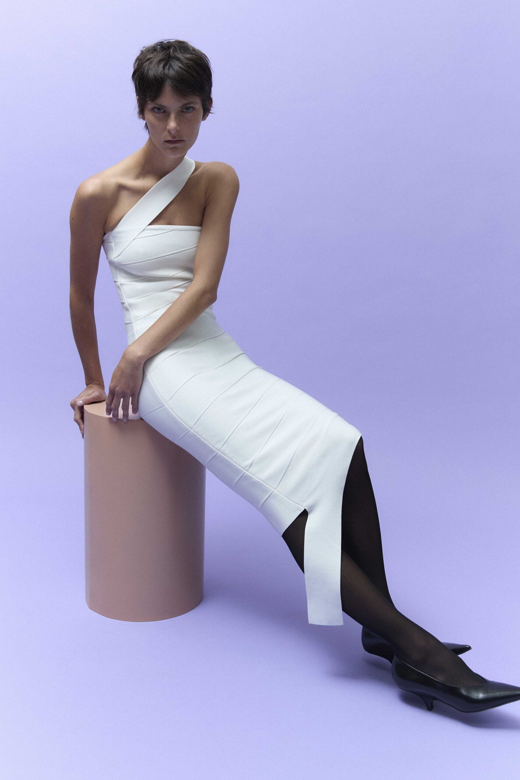 white fitted midi dress with slit