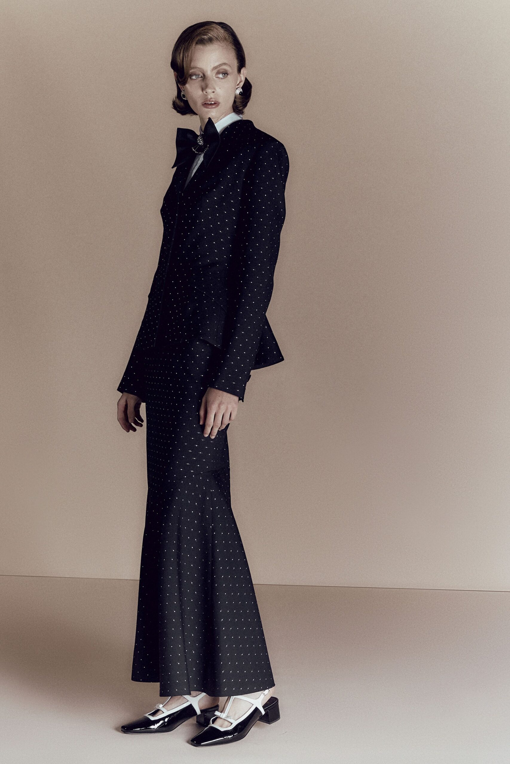 black cotton long-sleeve collared tailored buttoned flared suit