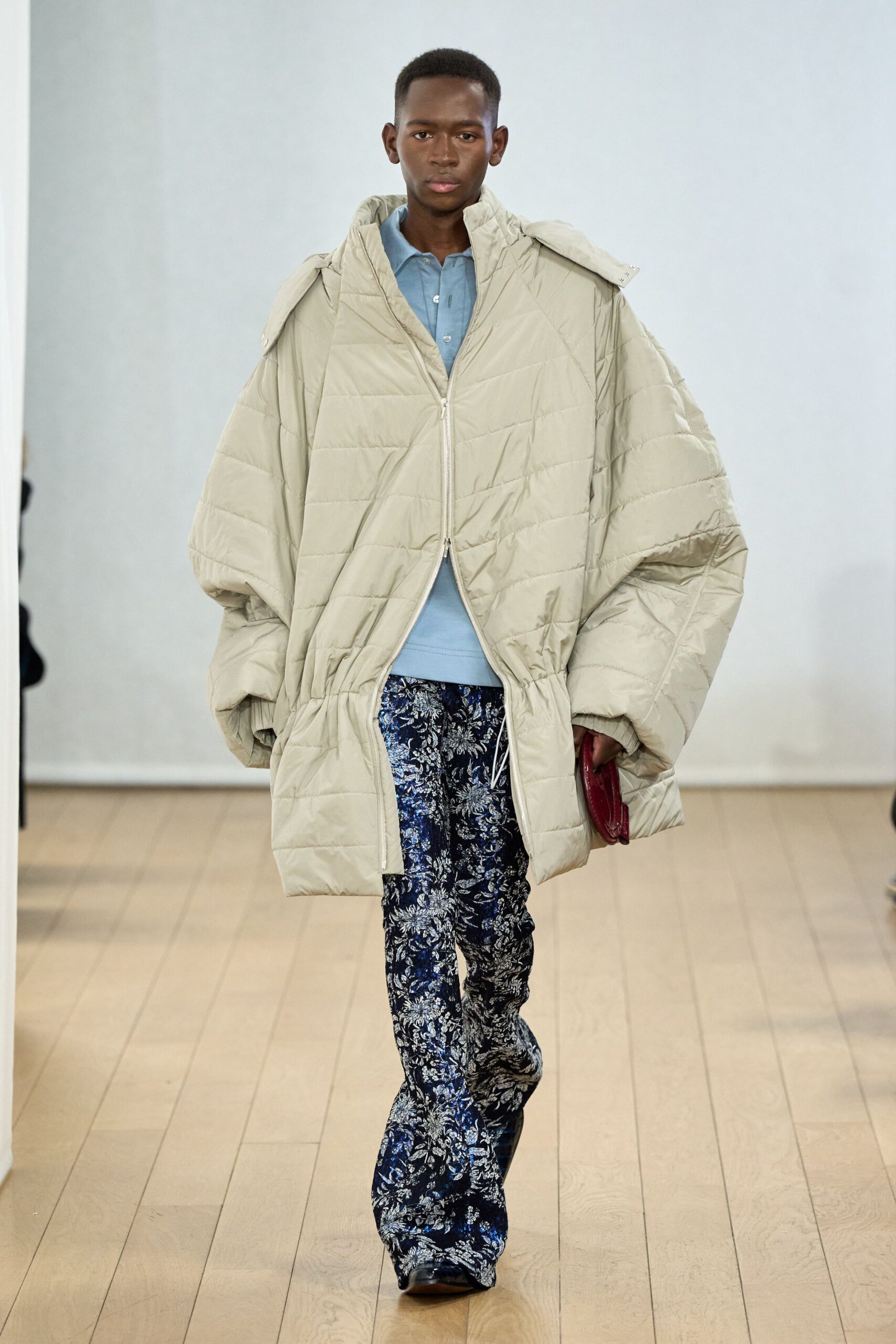 beige oversized coat with blue shirt