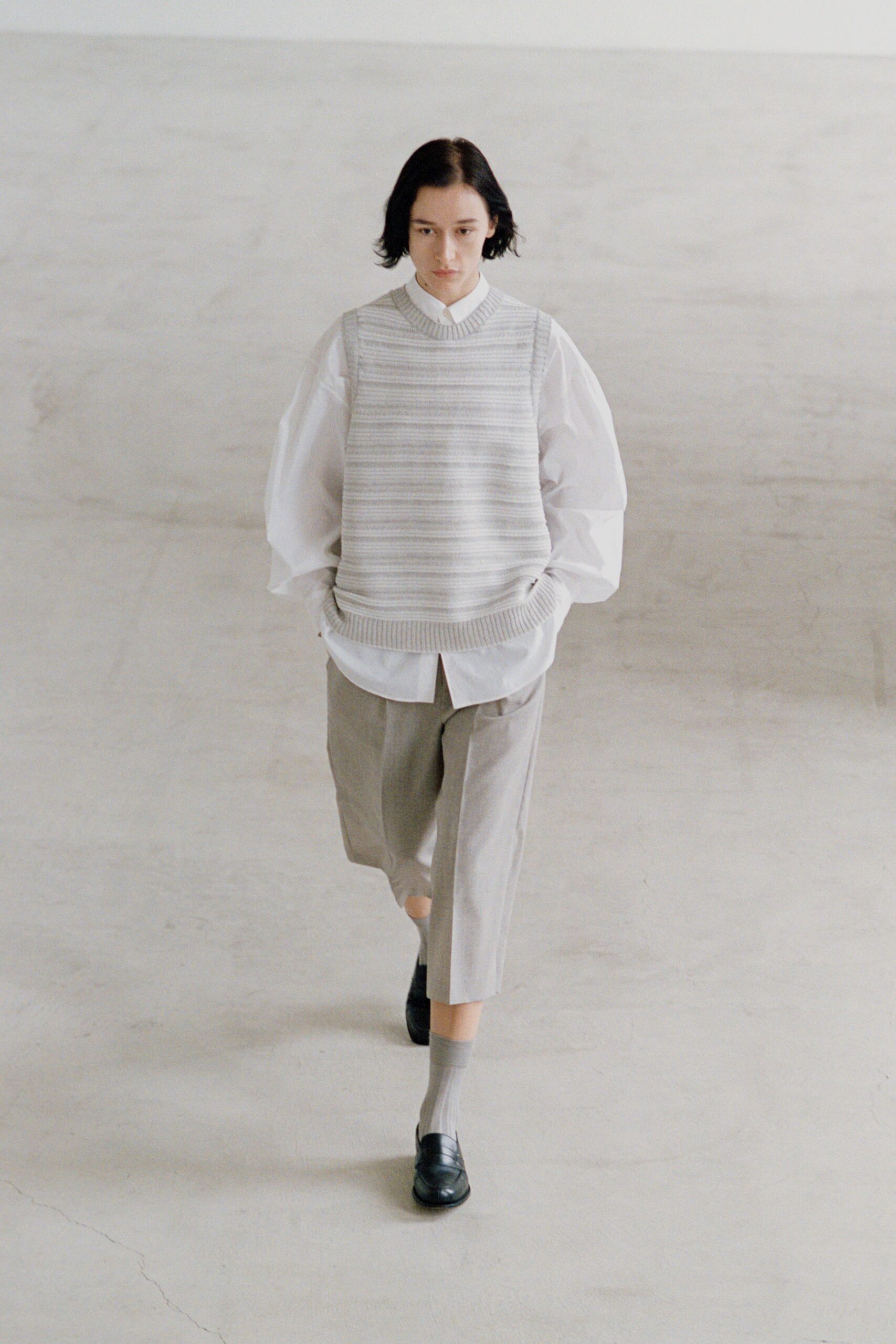 gray knit sleeveless high-neck relaxed striped vest