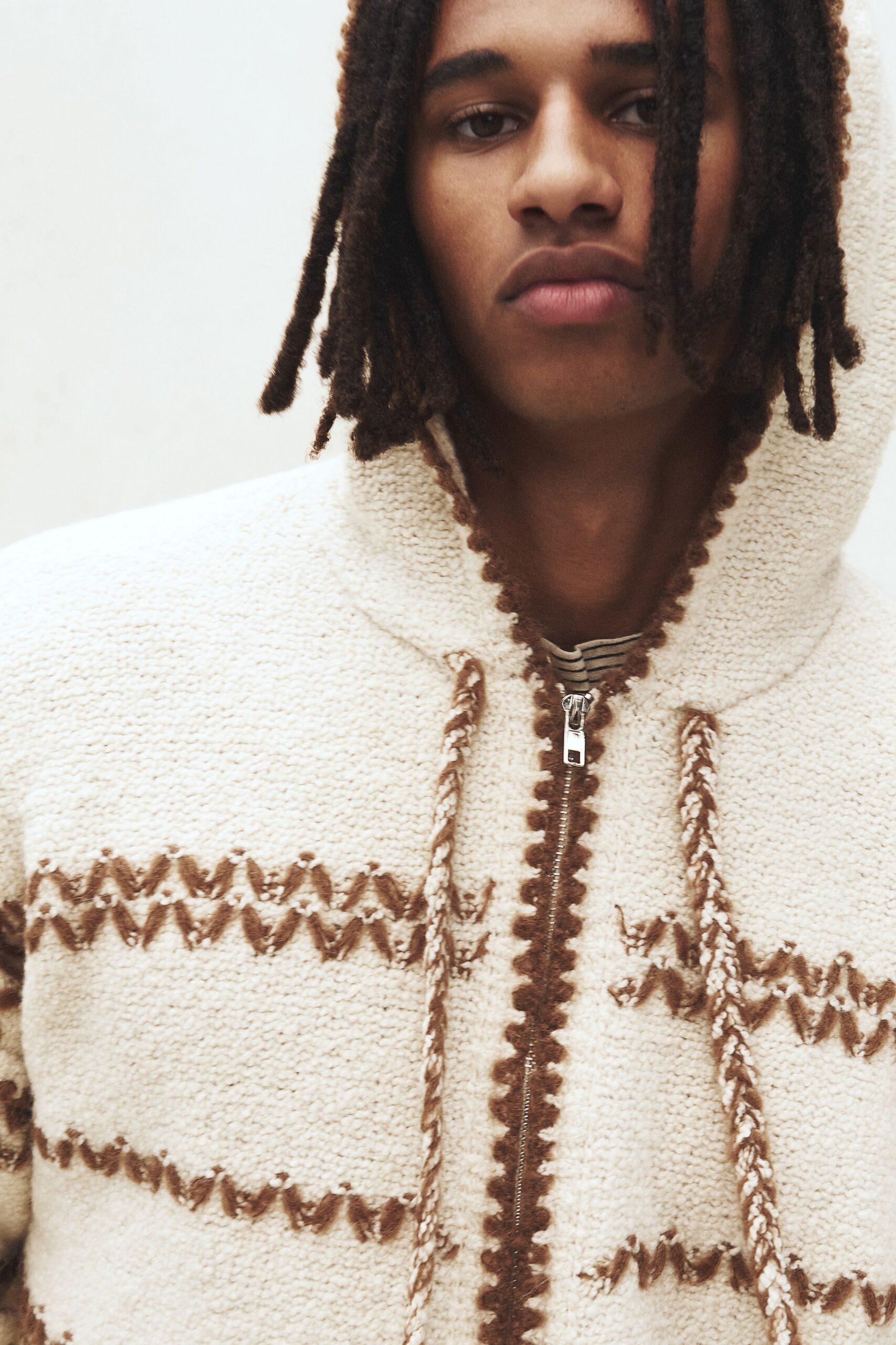 beige wool hooded jacket with striped shirt
