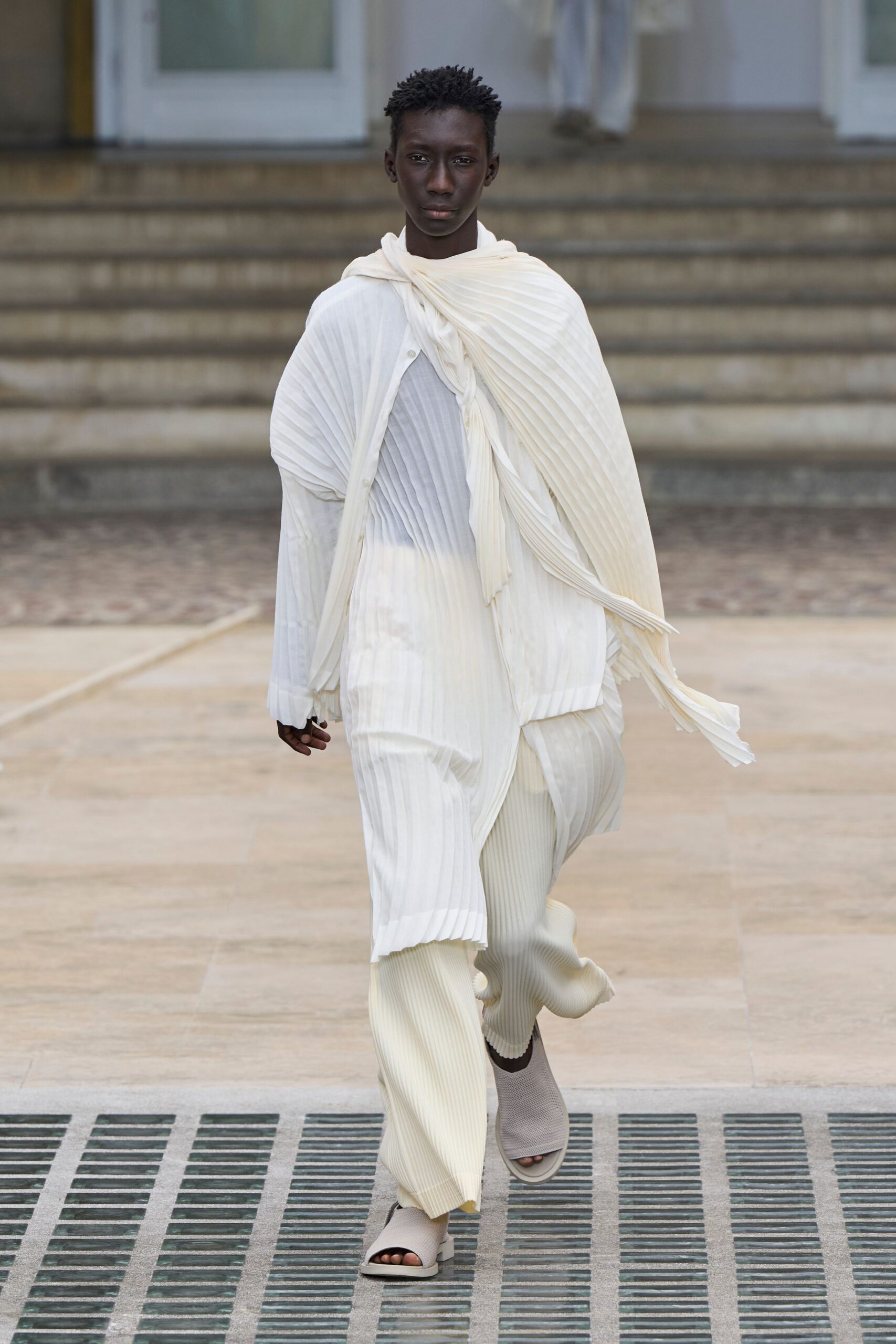 white pleated top and pants