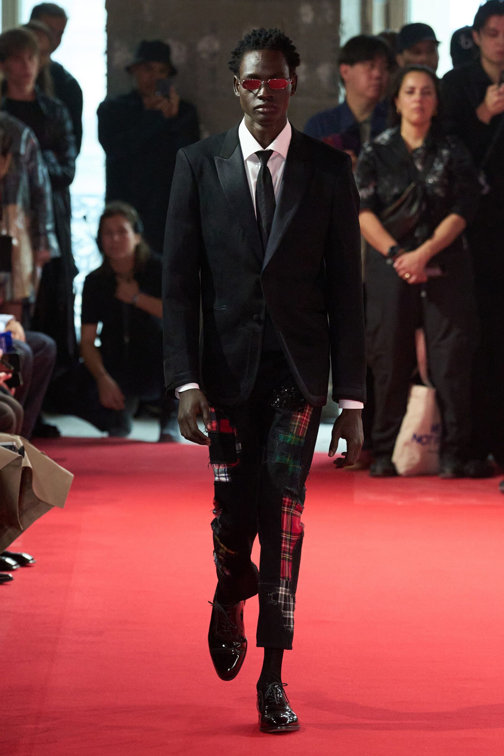 black tailored suit with checked pants