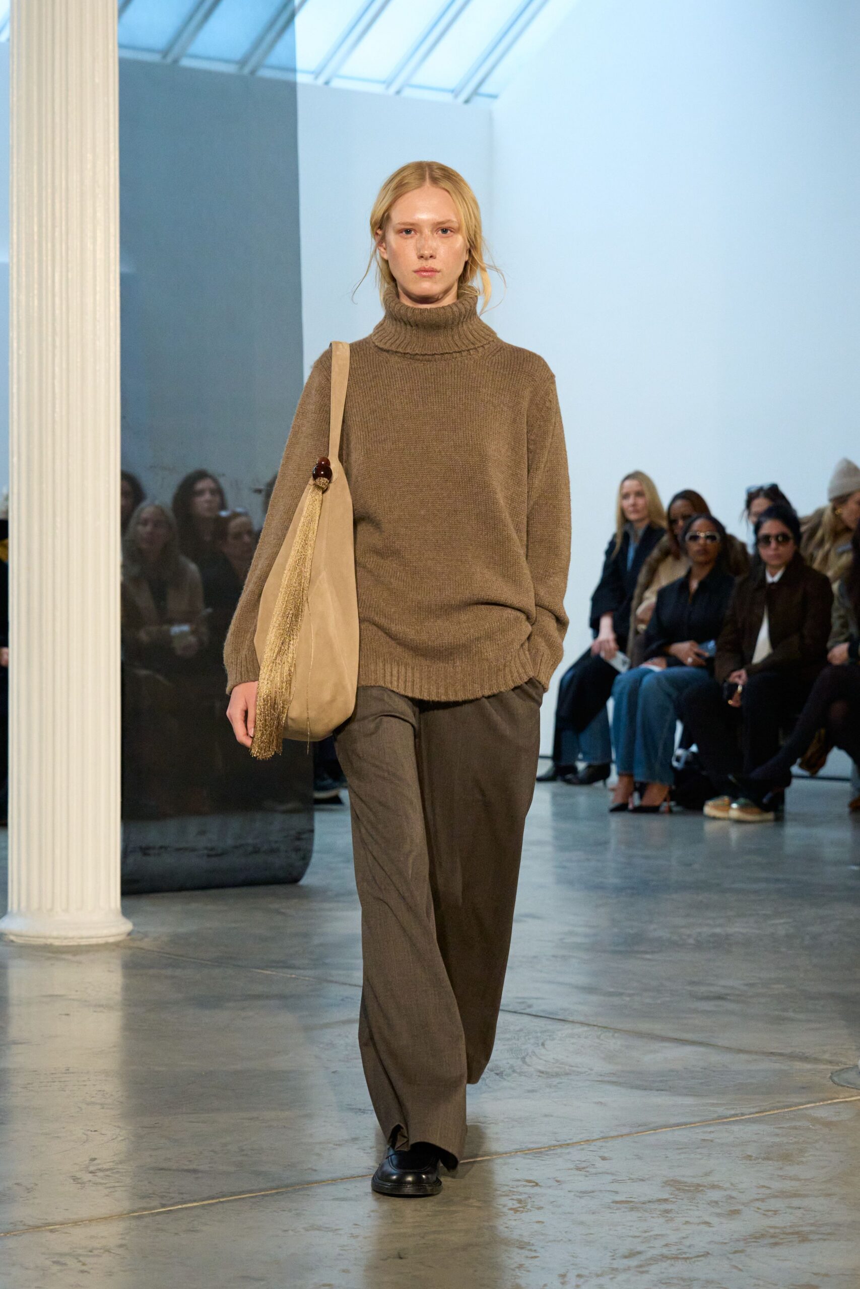 brown wool turtleneck sweater with gray tailored pants
