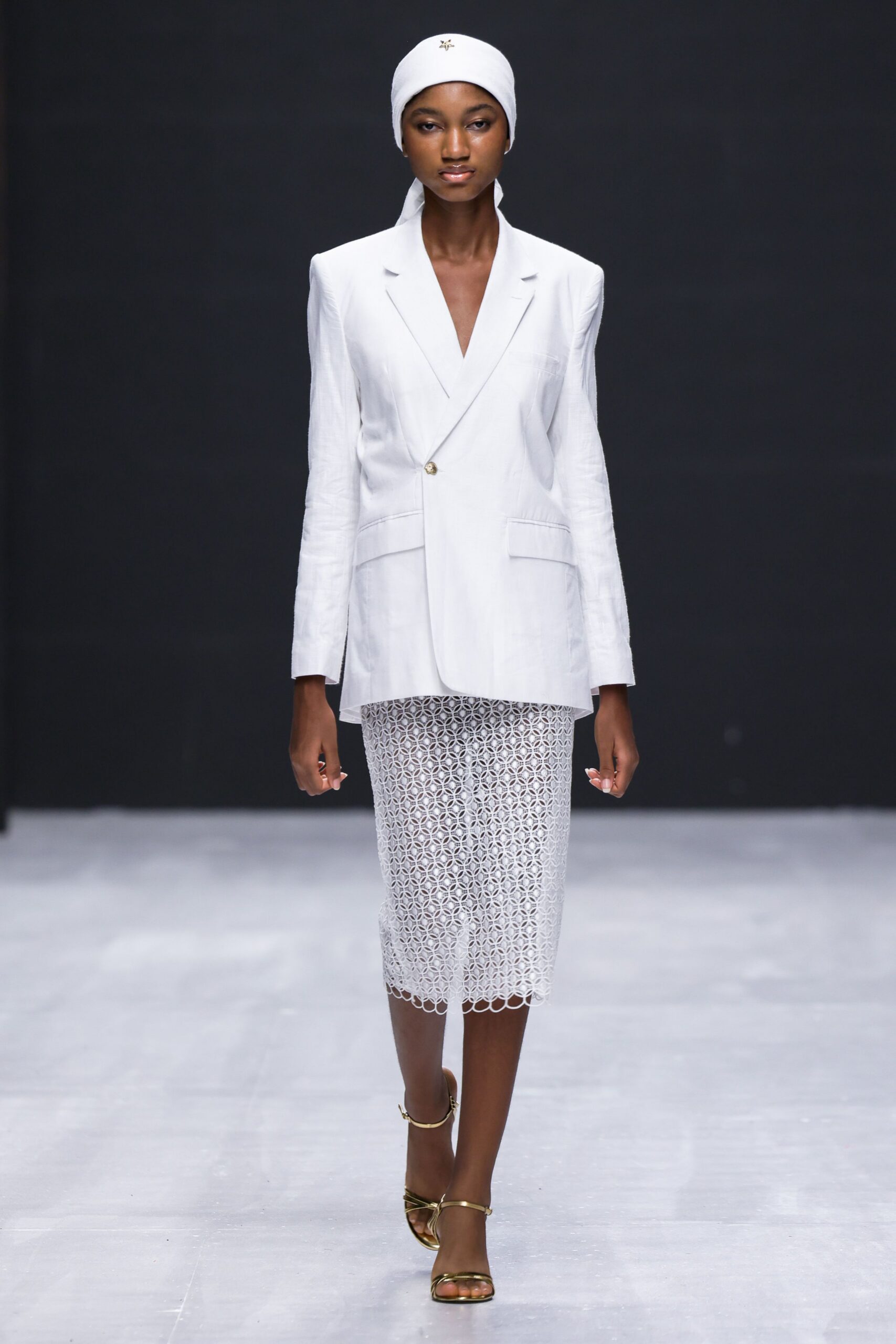 white tailored blazer with lace skirt