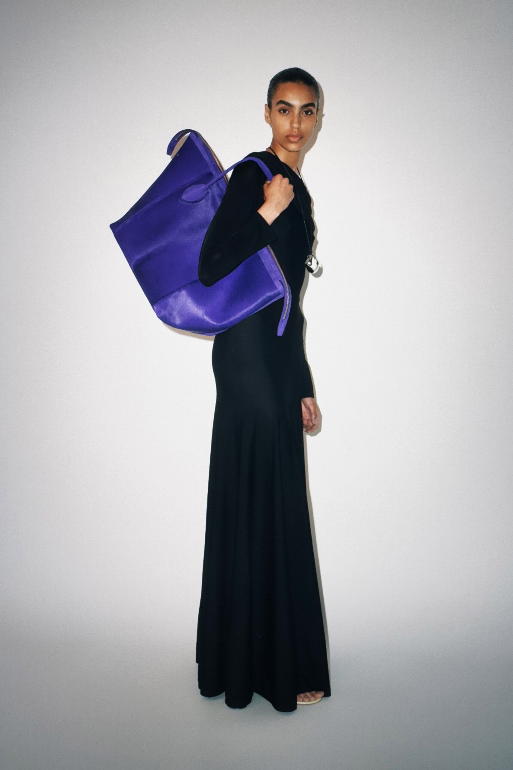 black fitted long-sleeve gown