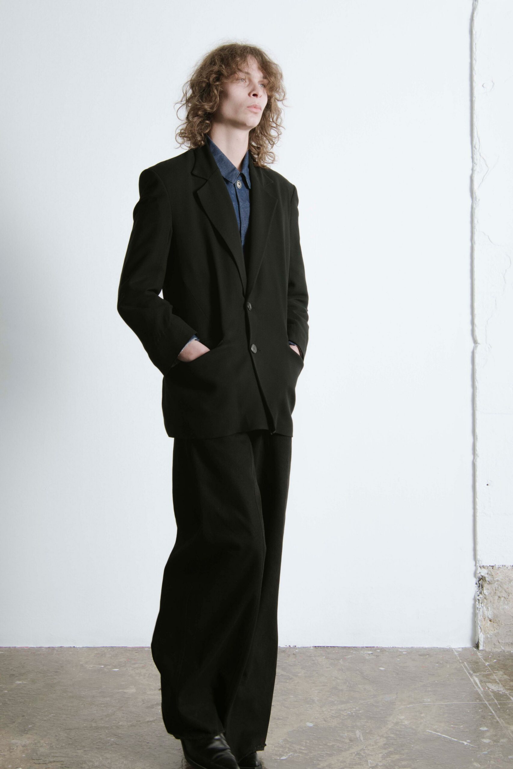 black relaxed suit with wide-leg pants