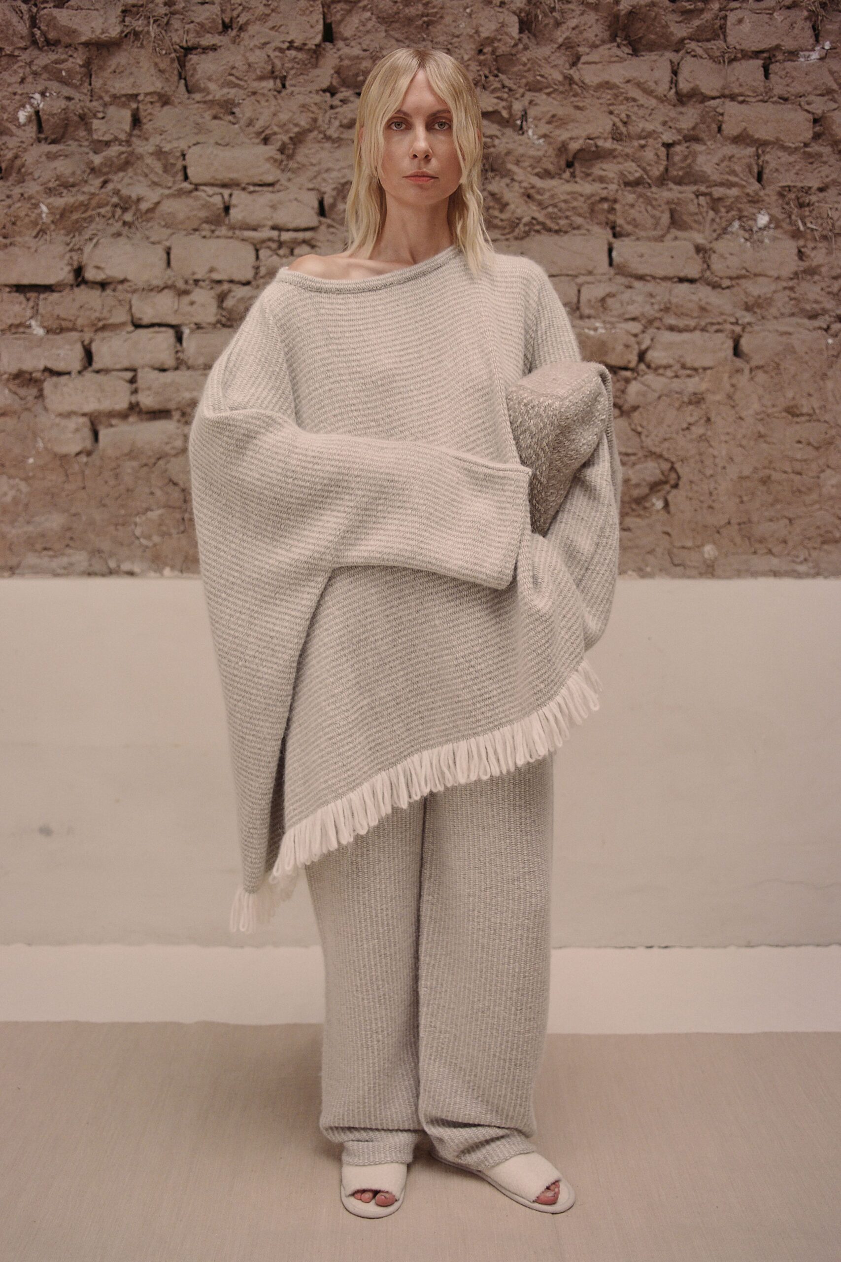 gray wool sleeveless off-shoulder oversized fringed sweater