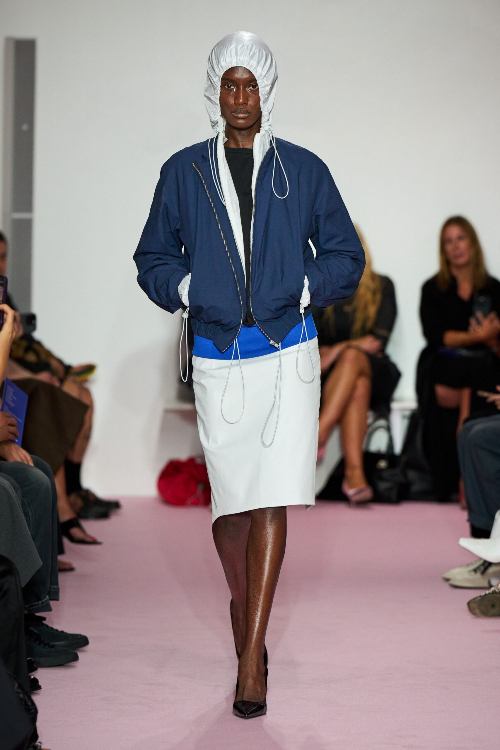 blue relaxed jacket white fitted skirt black shoes