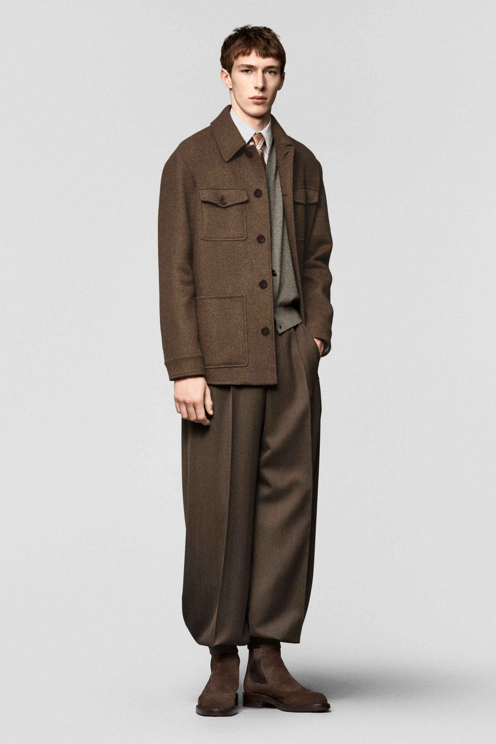 brown wool long-sleeve collared relaxed buttoned pockets jacket