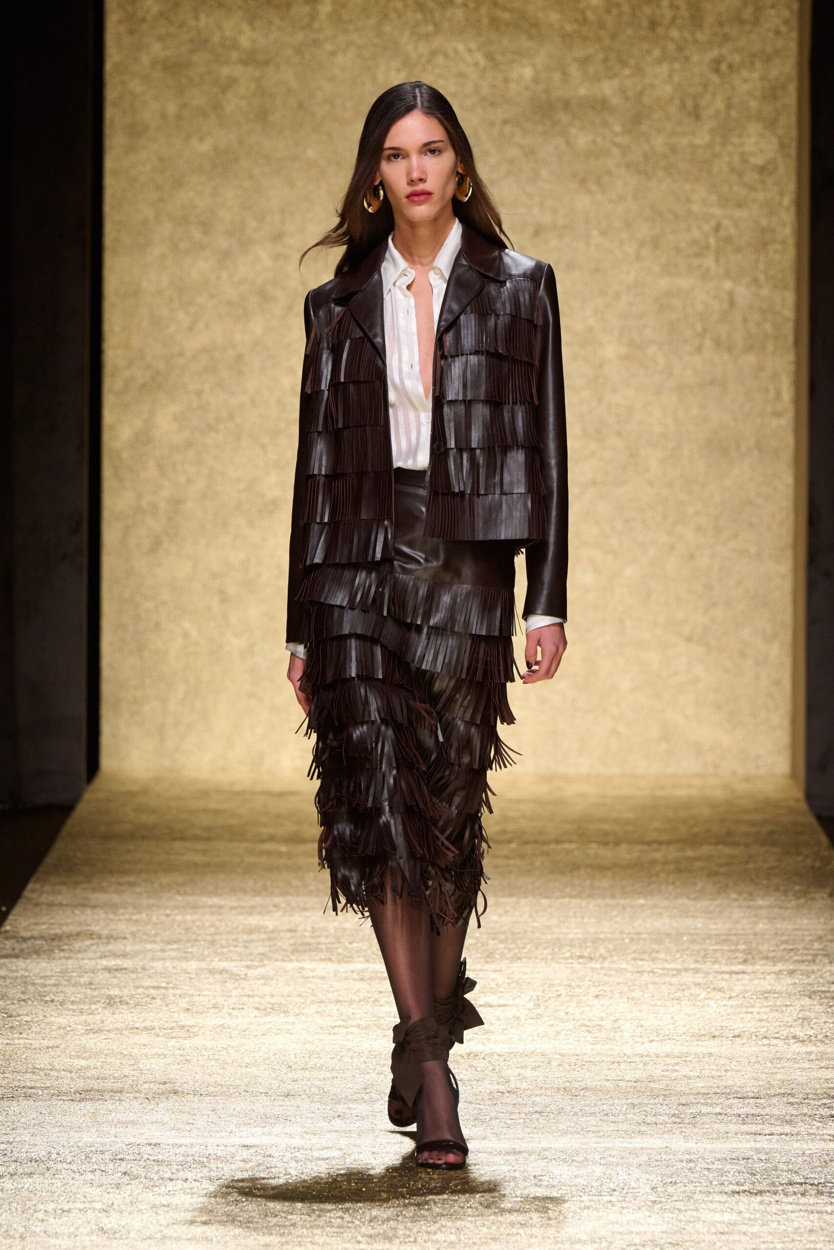 brown leather fringed jacket and skirt
