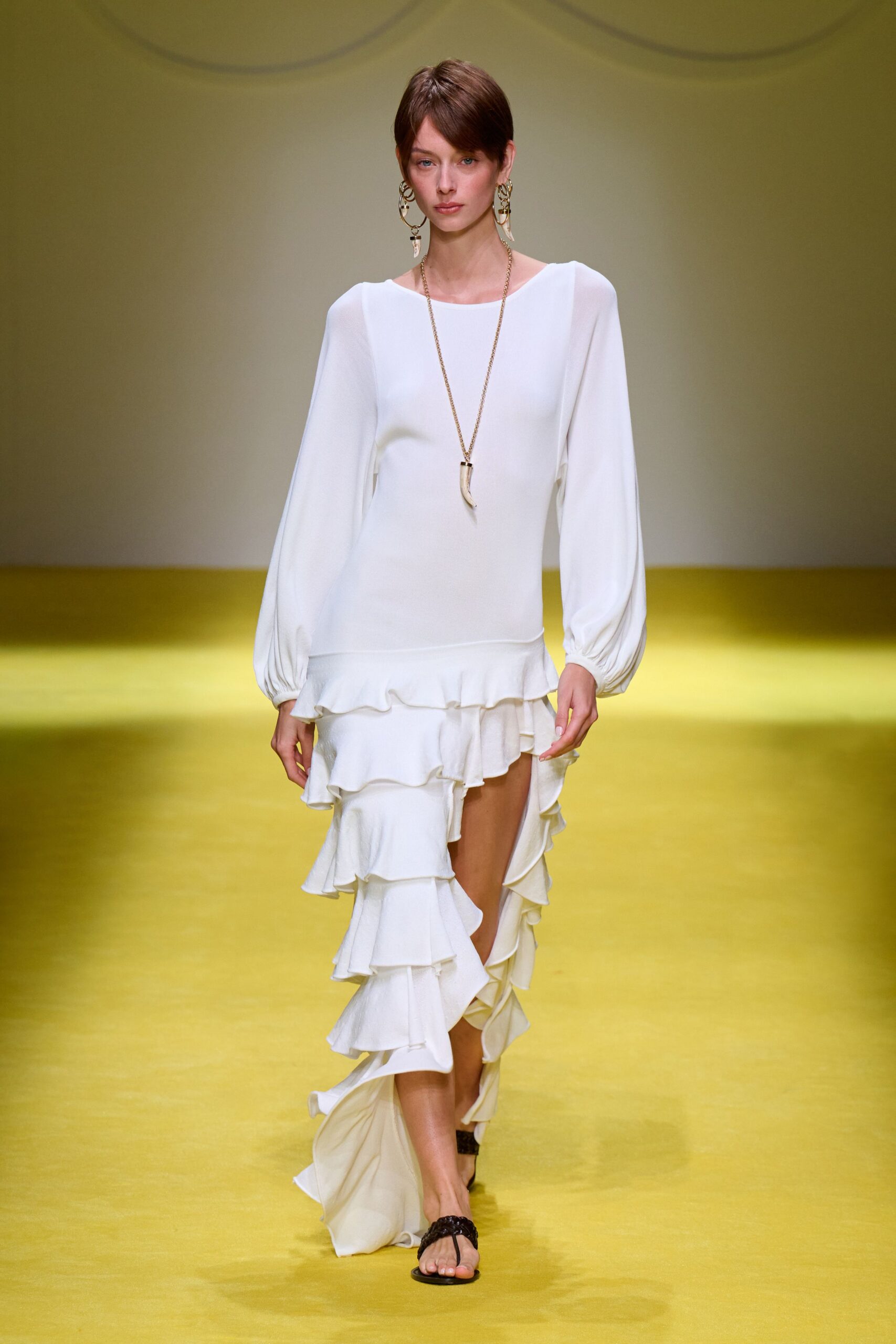 white ruffled maxi dress with black shoes