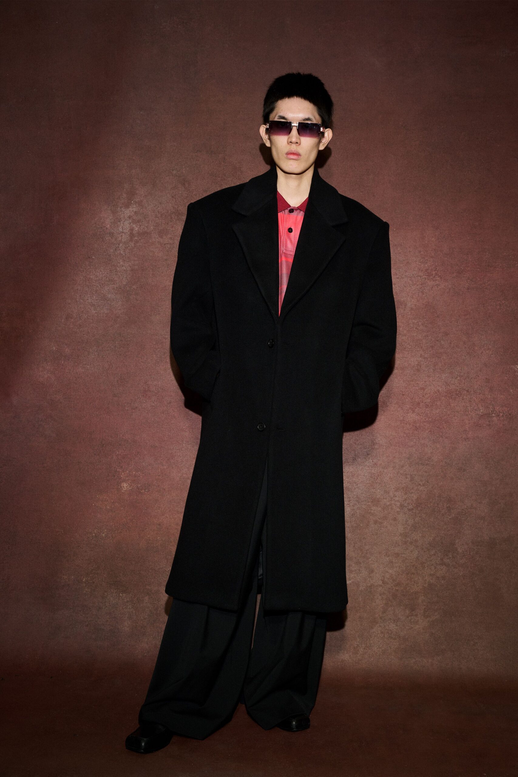 black wool coat with red shirt