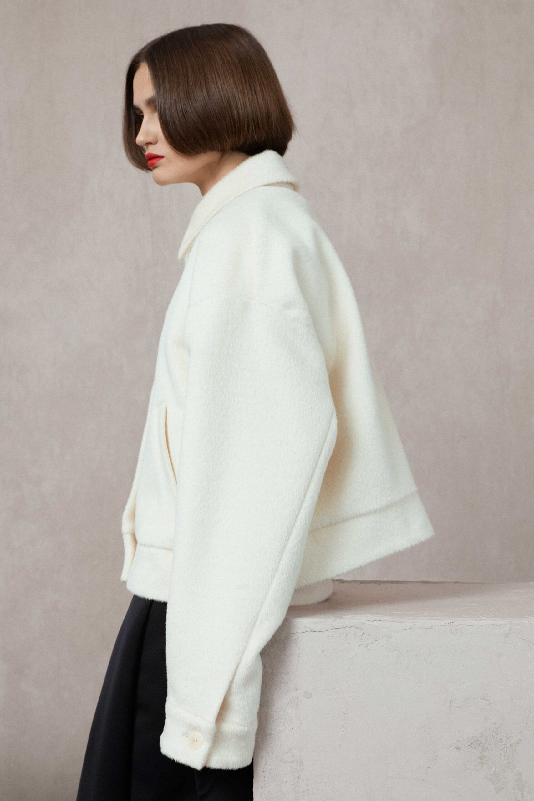 white wool long-sleeve collared oversized jacket