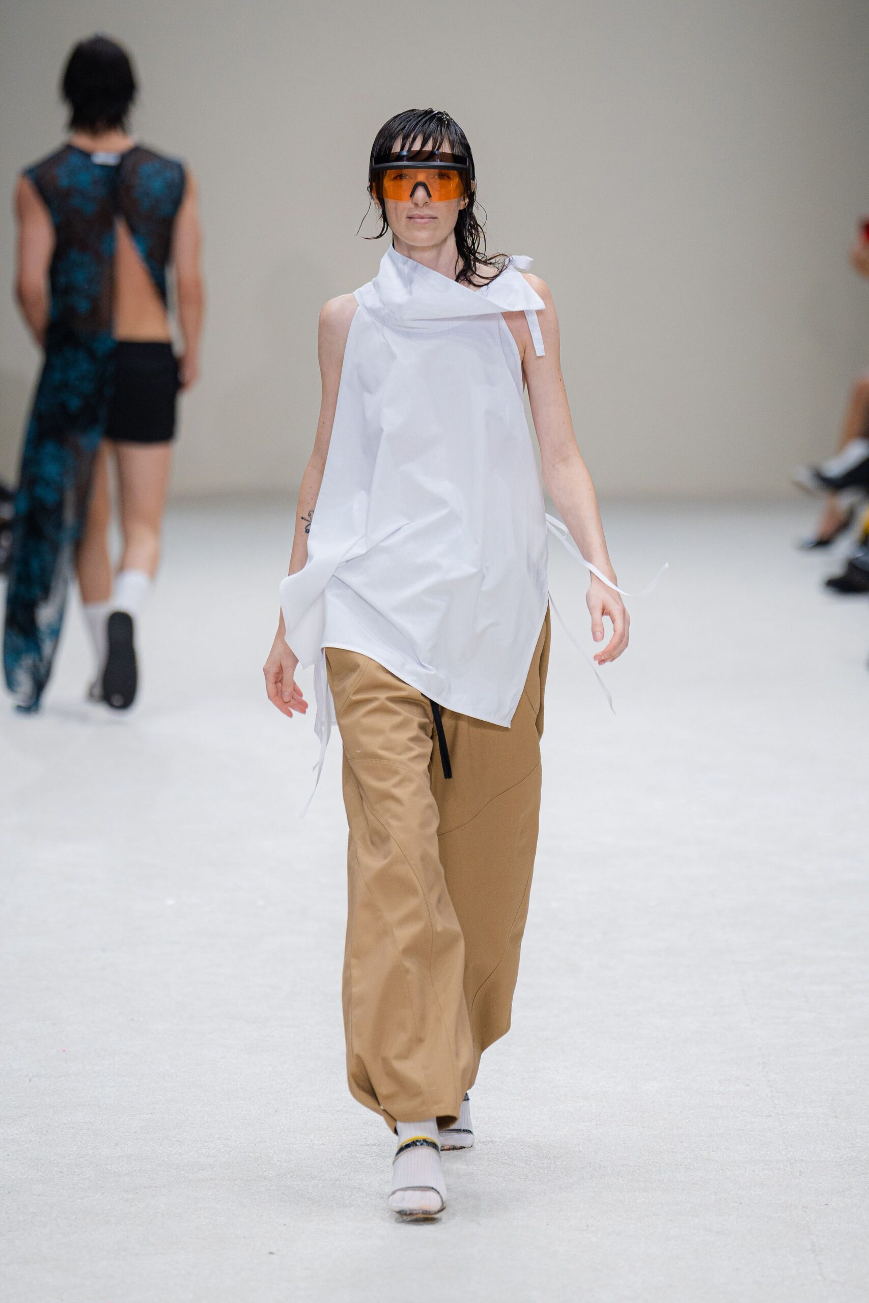white relaxed top beige pants
