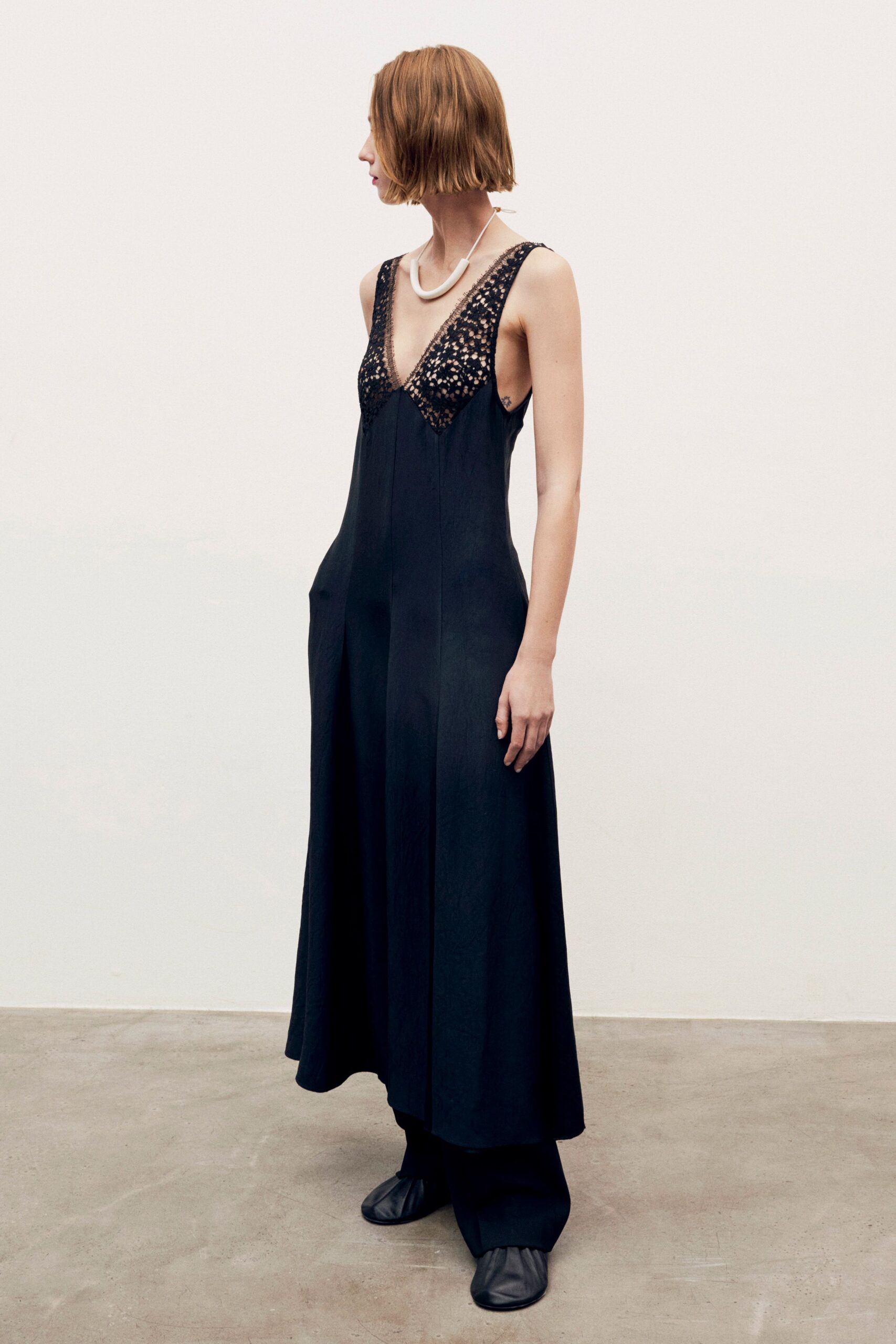 black cotton sleeveless v-neck relaxed beaded midi dress