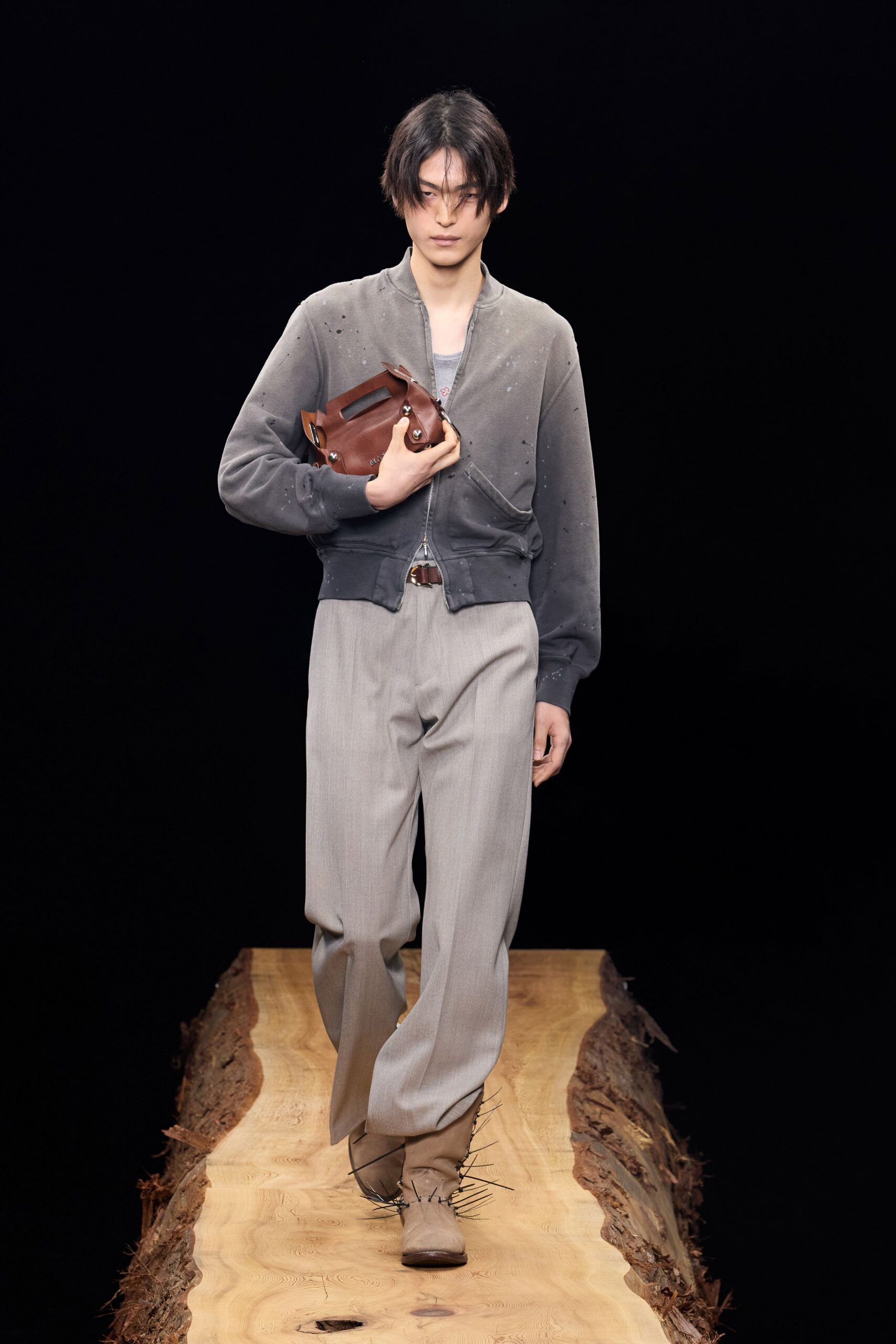 gray cotton relaxed jacket with beige tailored pants